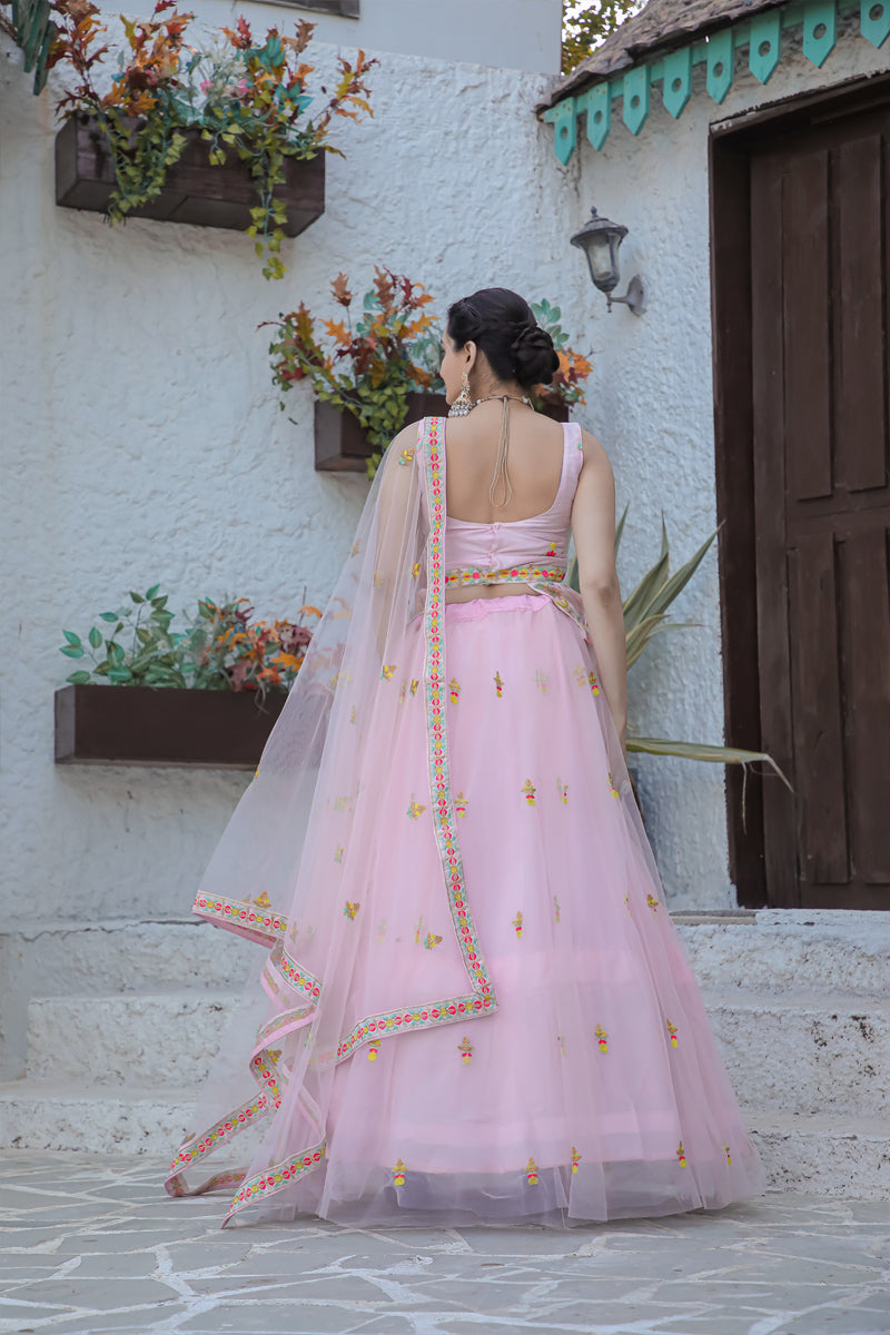 Stunning Double layer Net lehenga With Peplum style blouse