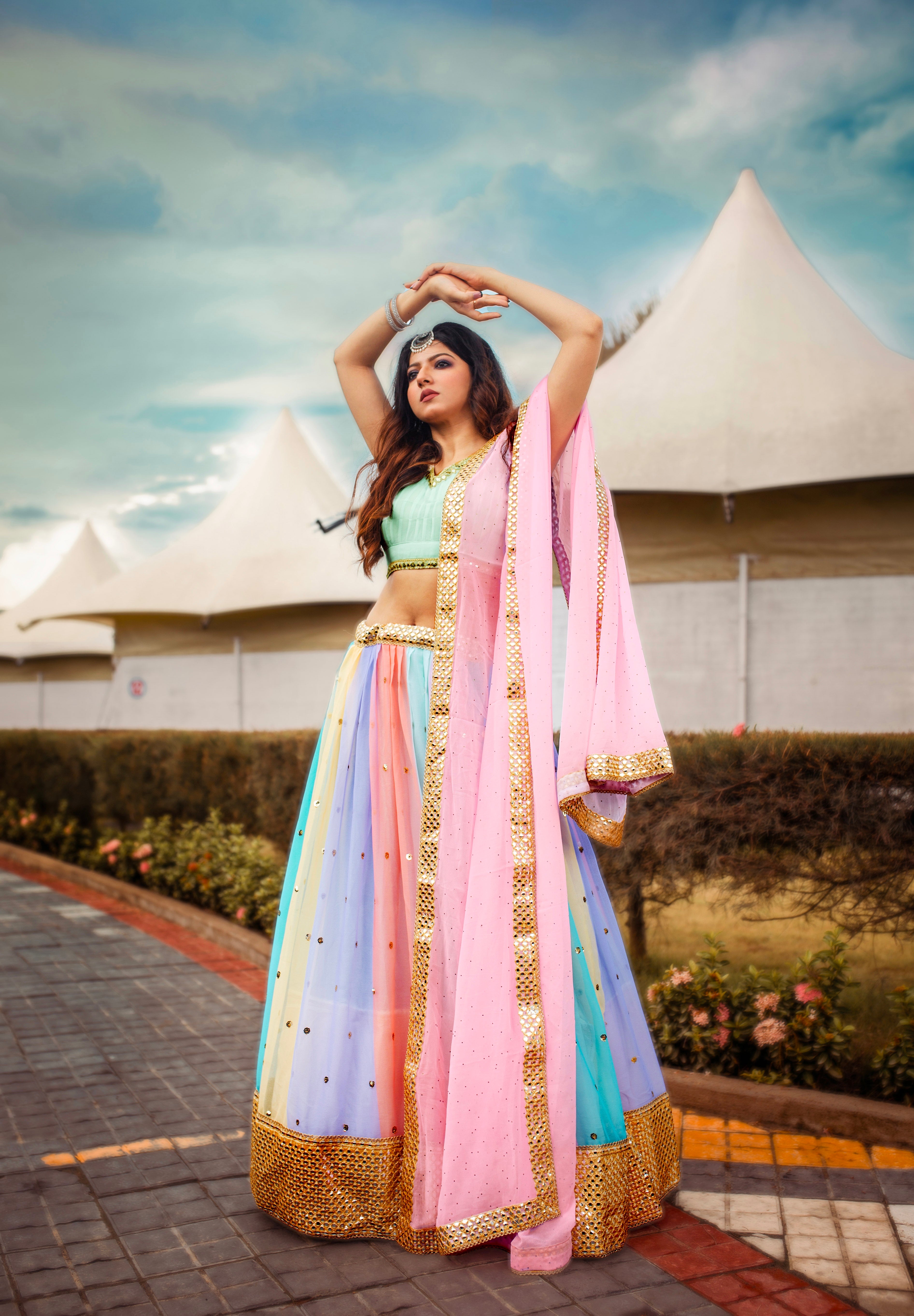 Experience the beauty of the East with our freshly arrived Multicolour lehenga set , this set is perfect for any occasion