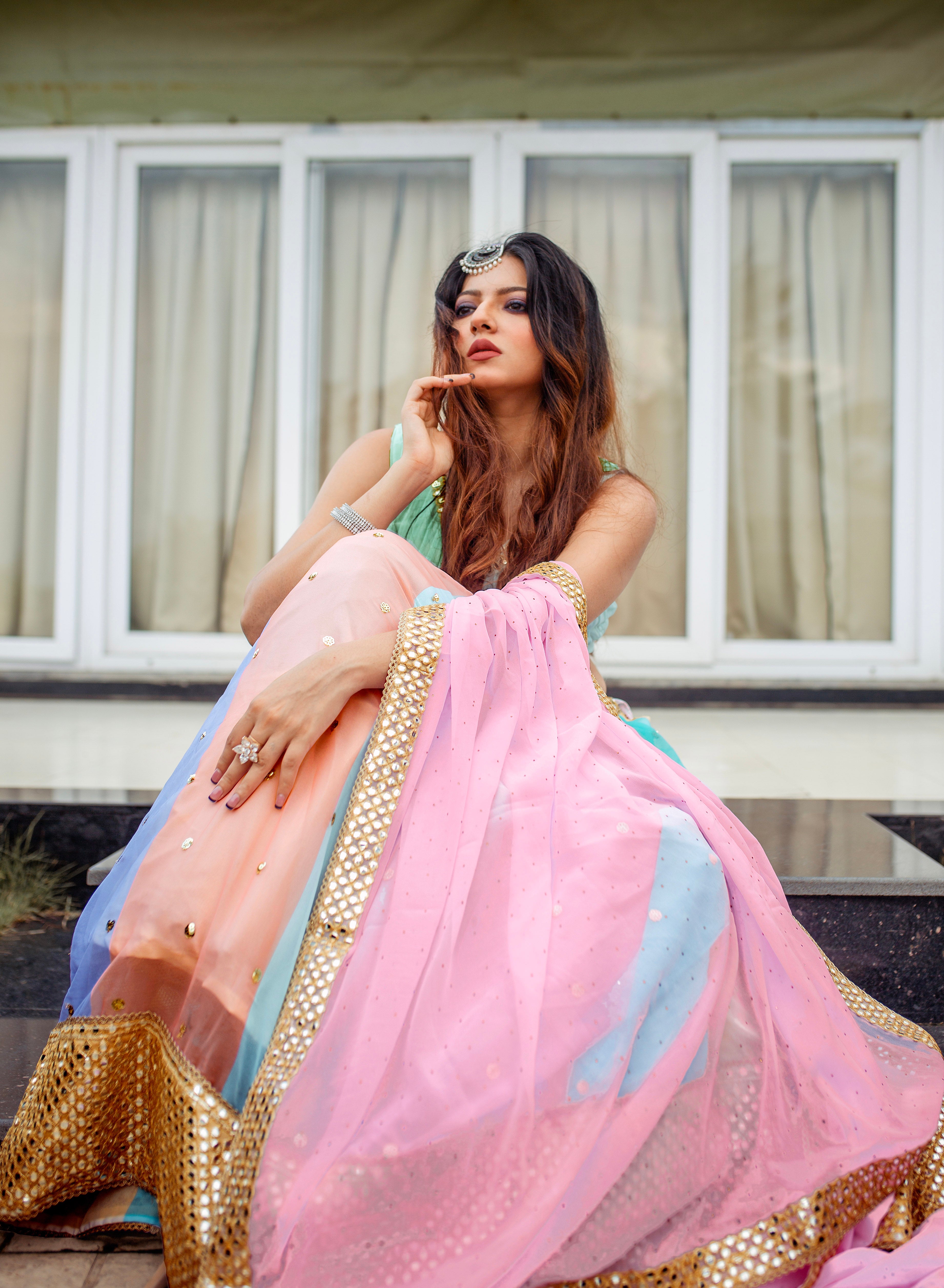 Experience the beauty of the East with our freshly arrived Multicolour lehenga set , this set is perfect for any occasion