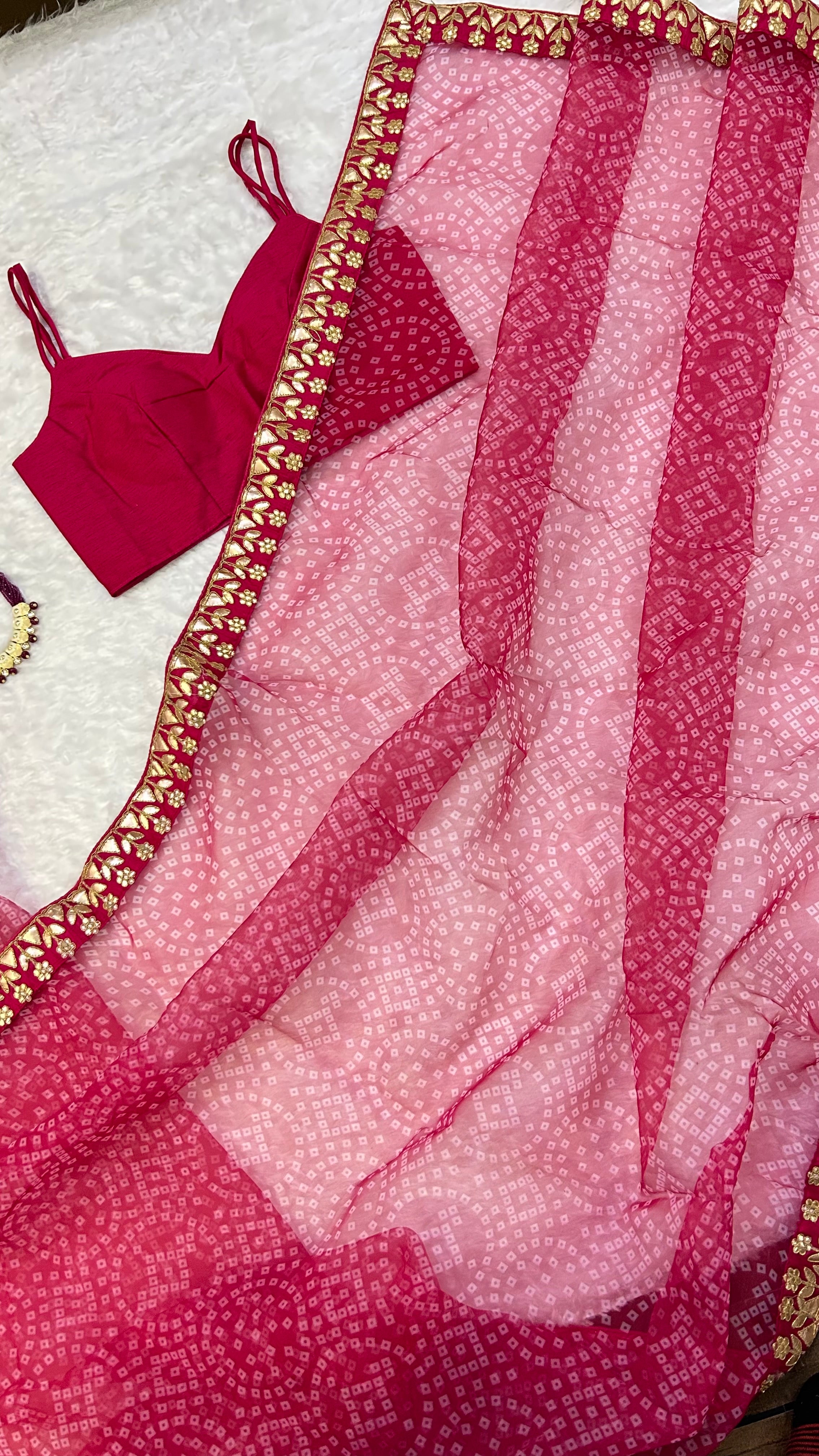 This saree is a Mood . Featuring: Bloom Bandhani Organza Saree