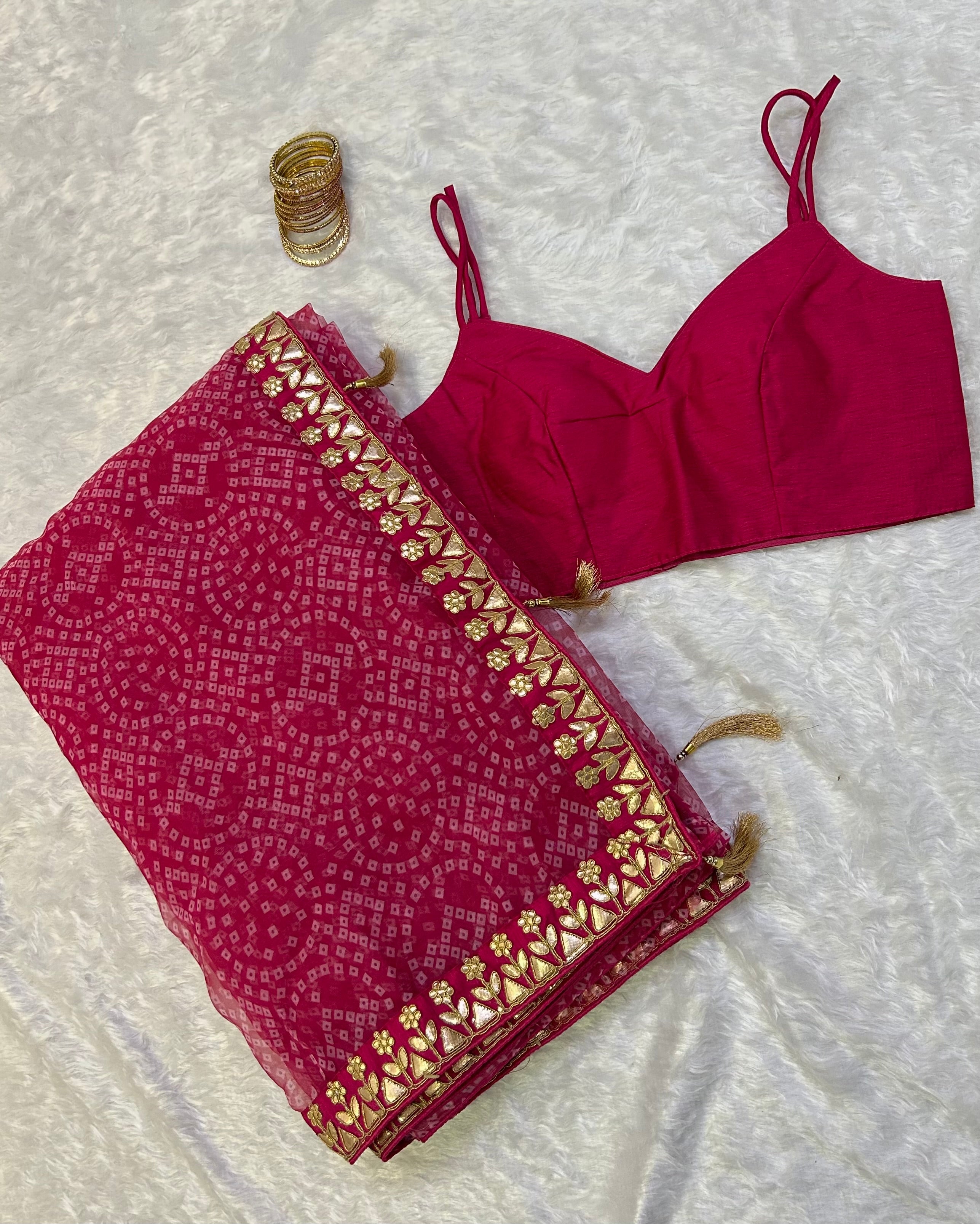 This saree is a Mood . Featuring: Bloom Bandhani Organza Saree