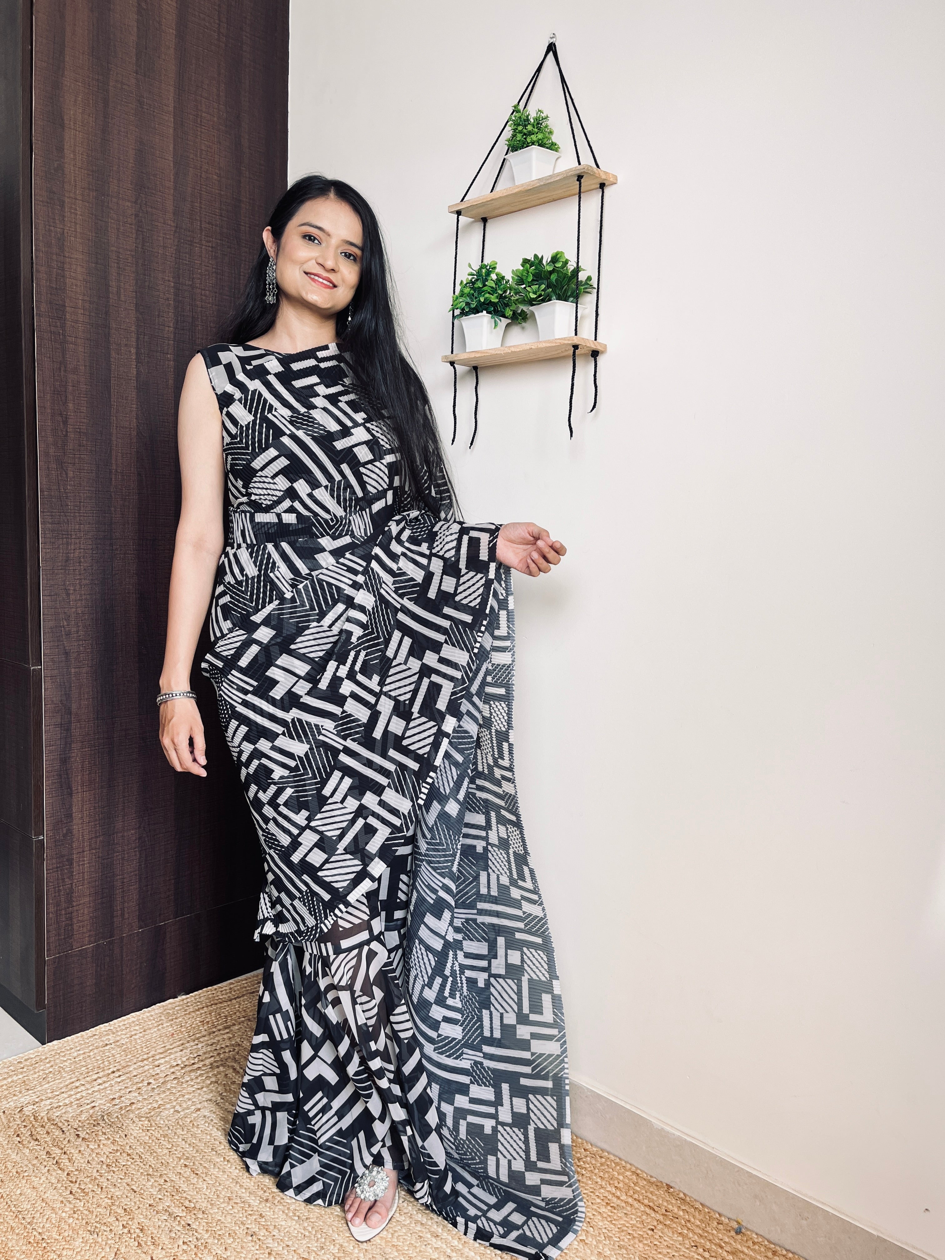 Get ready this festive season with this pre Drapped saree Gown