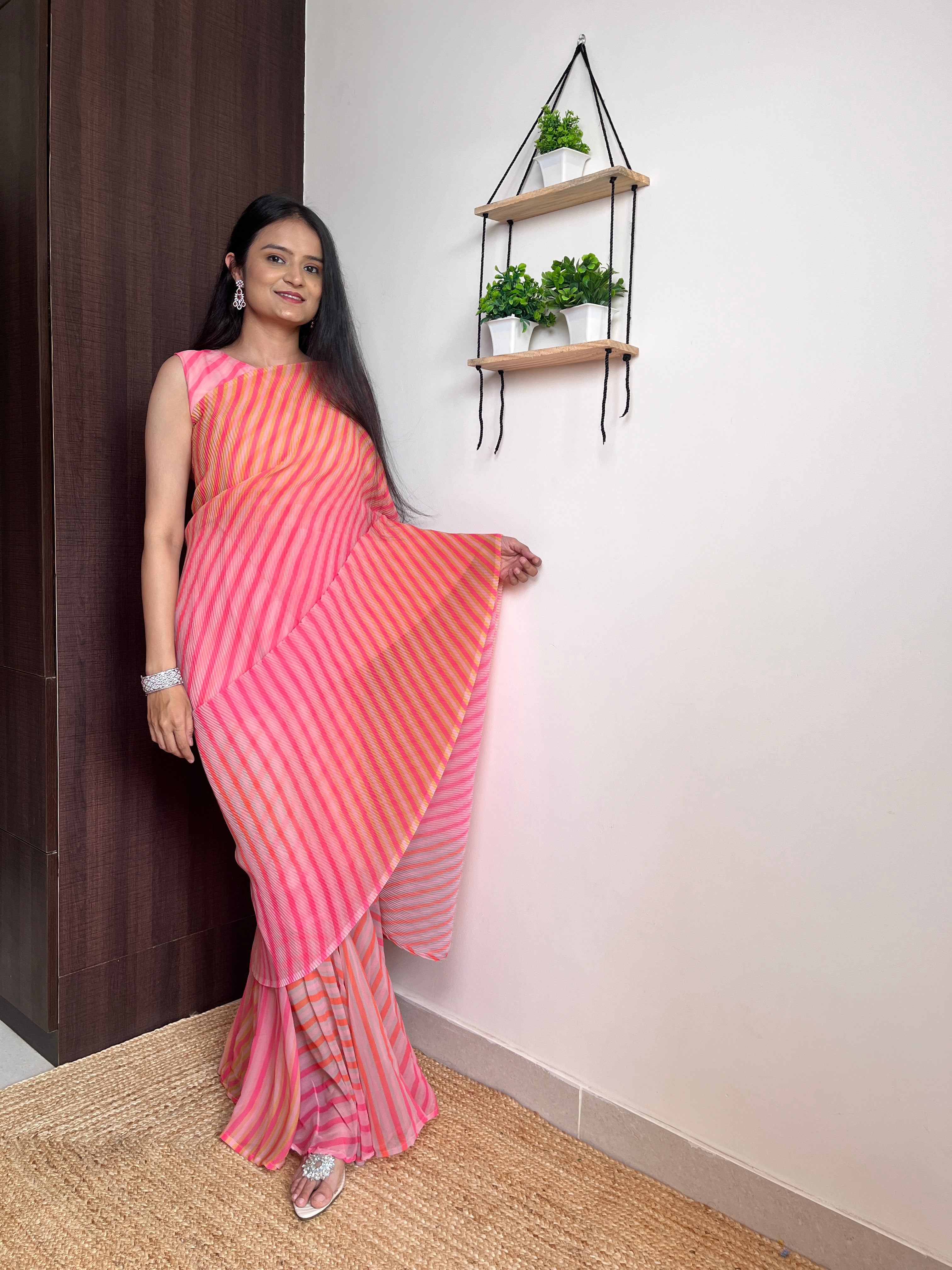 Get ready this festive season with this pre Drapped saree Gown
