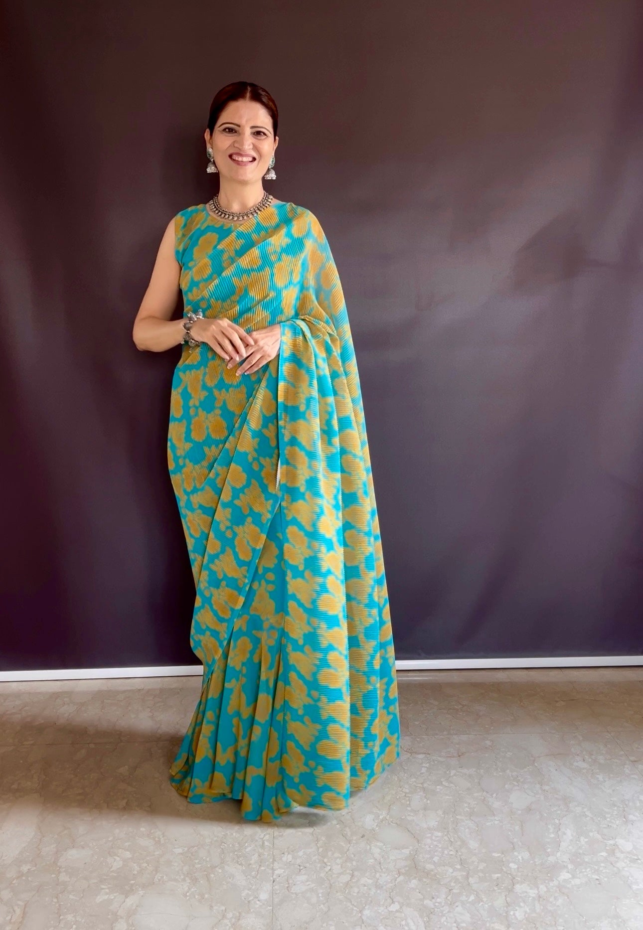 Get ready this festive season with this pre Drapped saree Gown