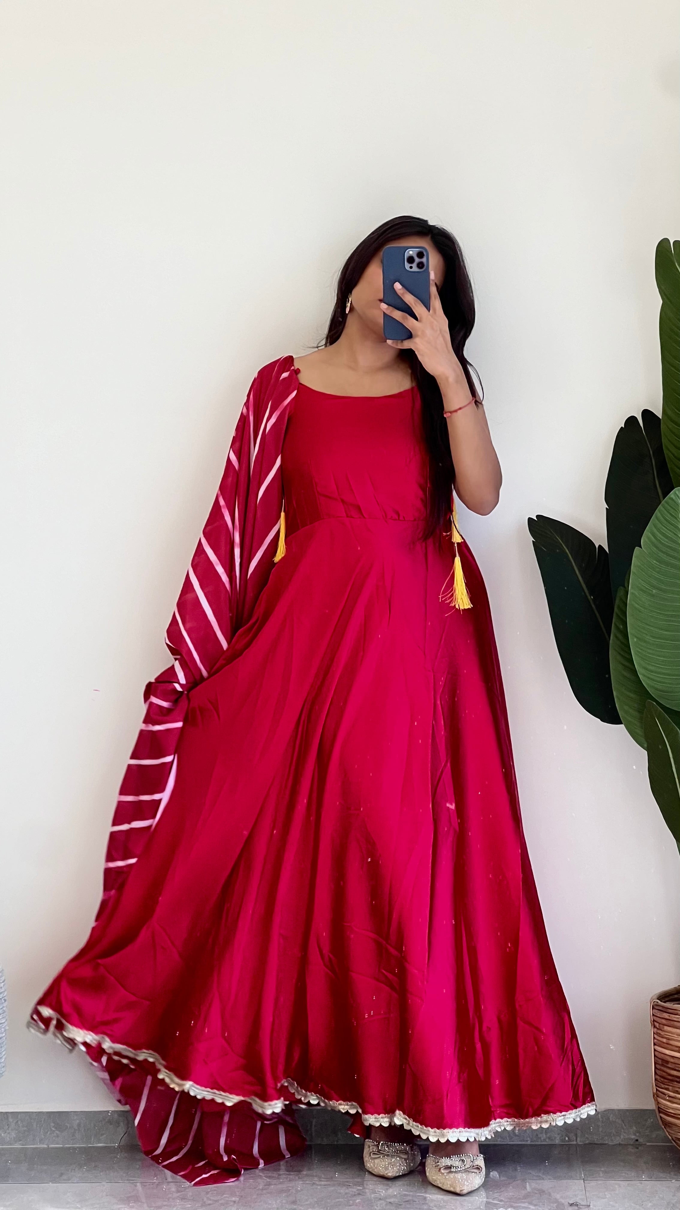 This red suit features a stunning Leheriya print dupatta , Elevate your look and make a statement with this unique and vibrant suit.