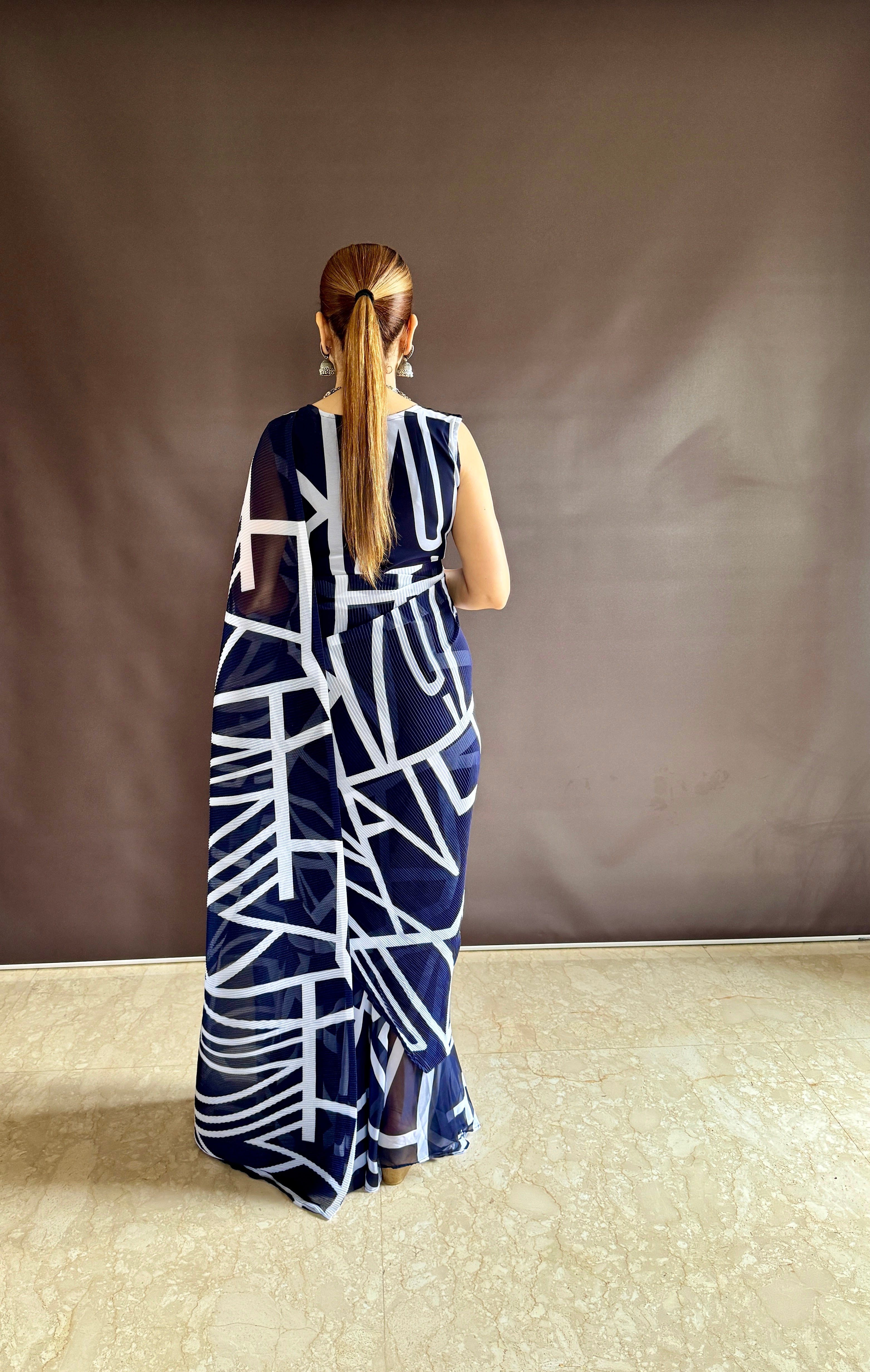Elevate your style with vibrant colorful prints of Gown Saree