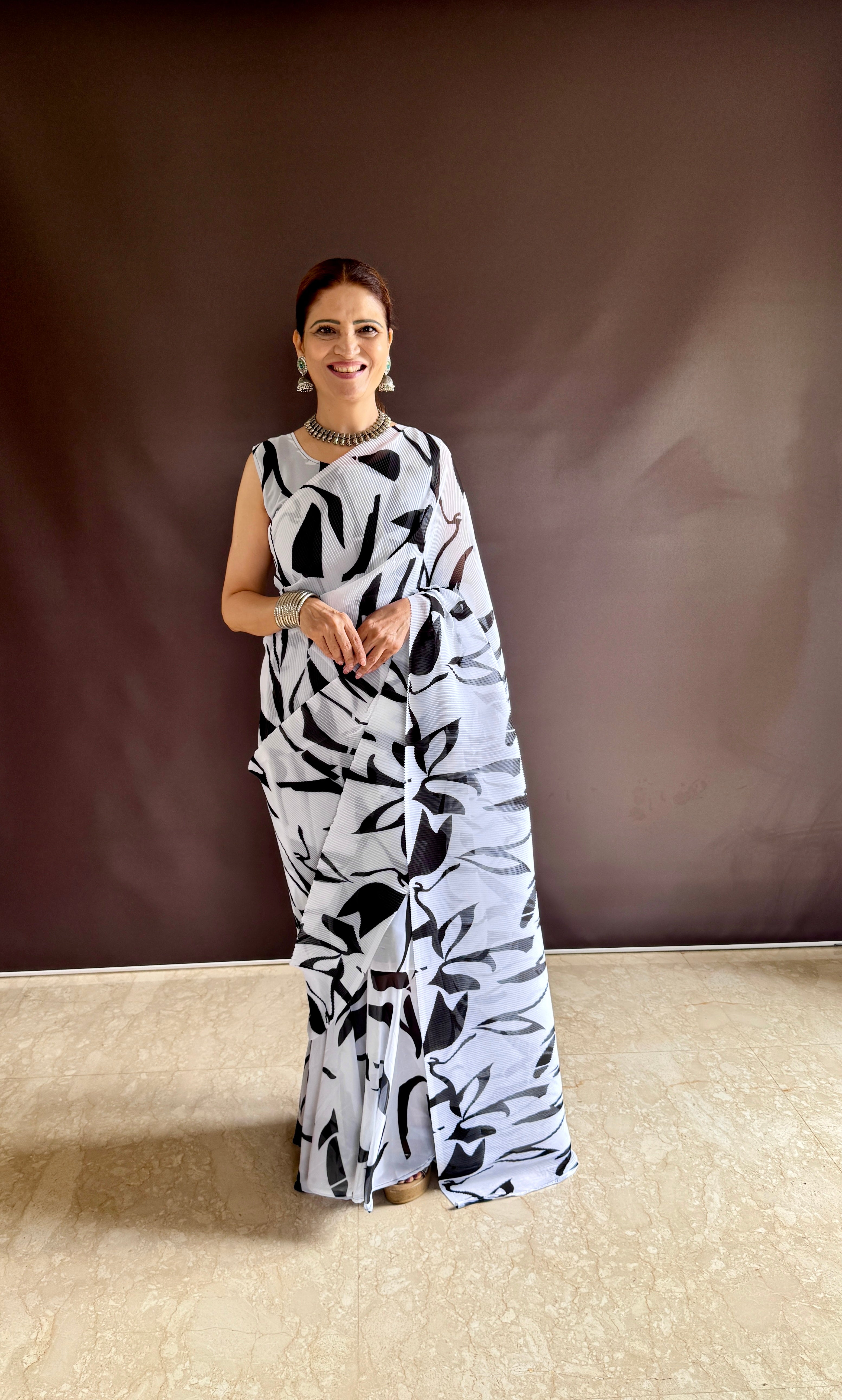 Elevate your style with vibrant colorful prints of Gown Saree