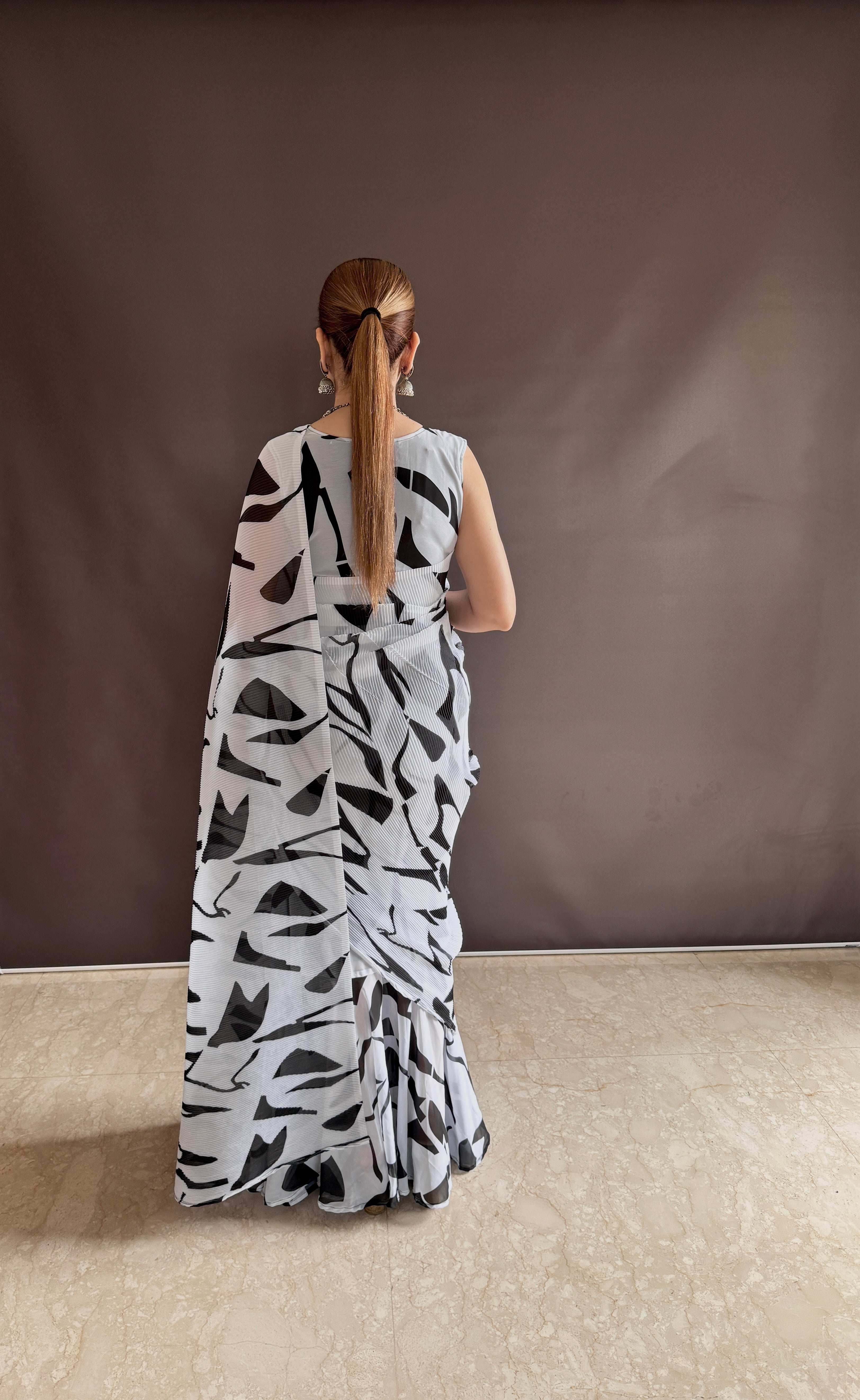 Elevate your style with vibrant colorful prints of Gown Saree