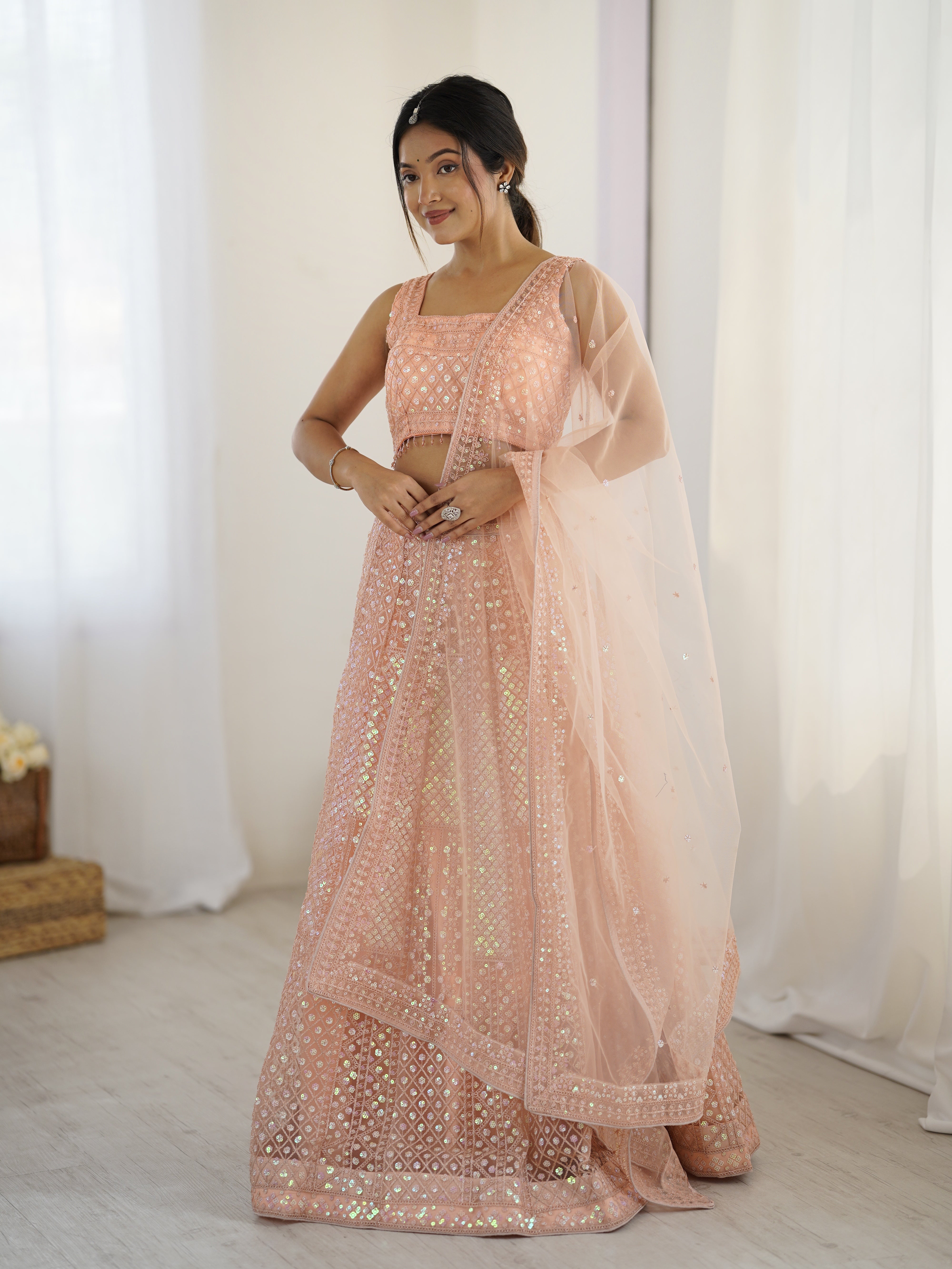 Sparkling Peach Net Lehenga Set