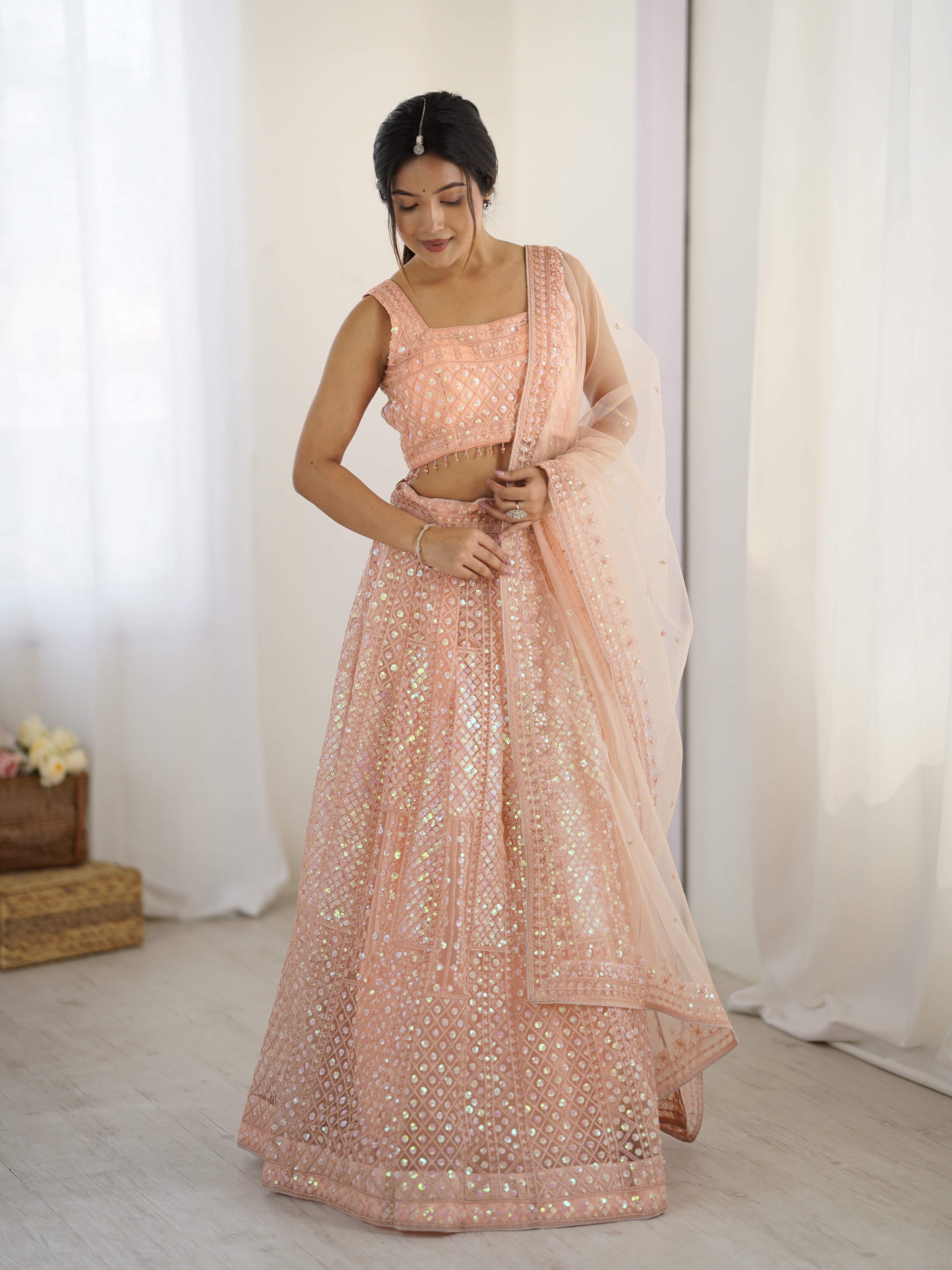 Sparkling Peach Net Lehenga Set