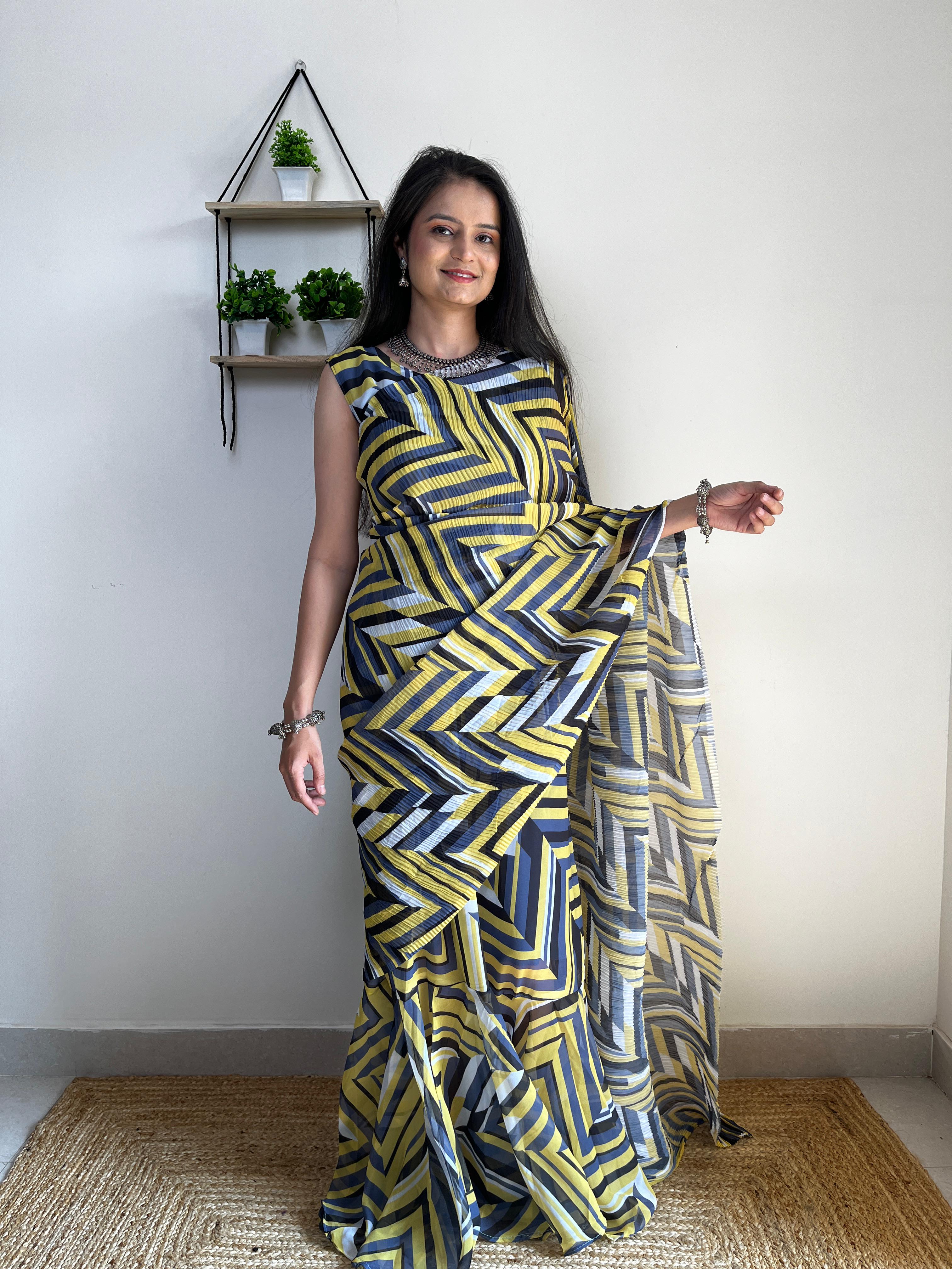 Get ready this festive season with this pre Drapped saree Gown