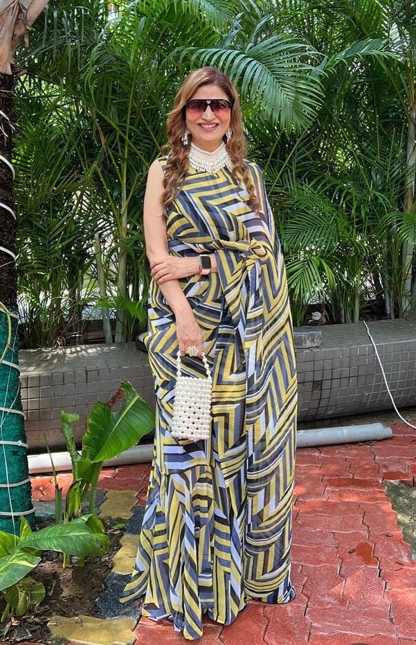 Get ready this festive season with this pre Drapped saree Gown