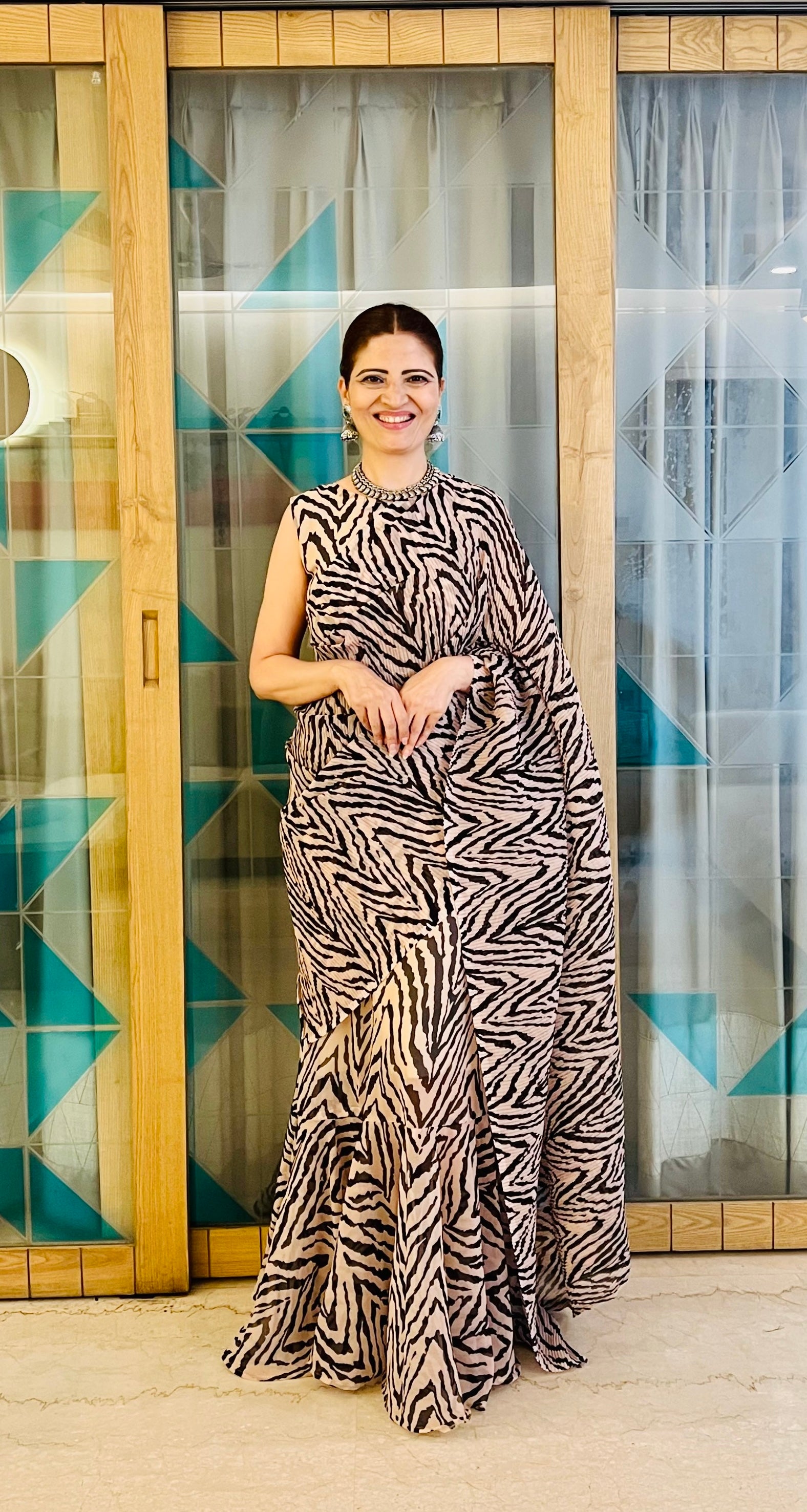 Get ready this festive season with this pre Drapped saree Gown
