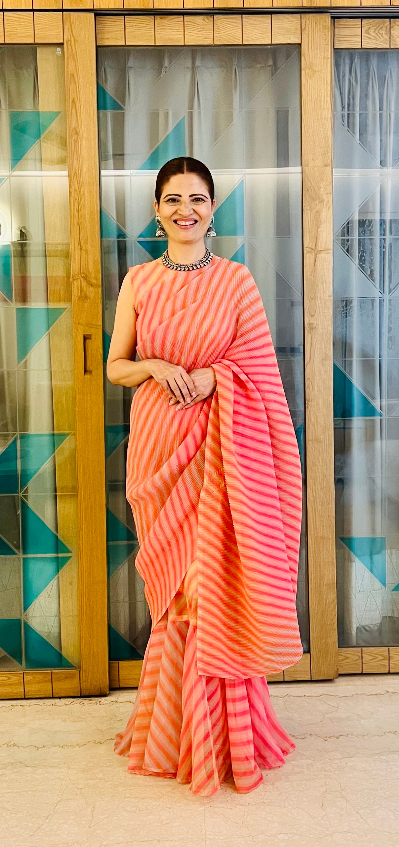 Get ready this festive season with this pre Drapped saree Gown