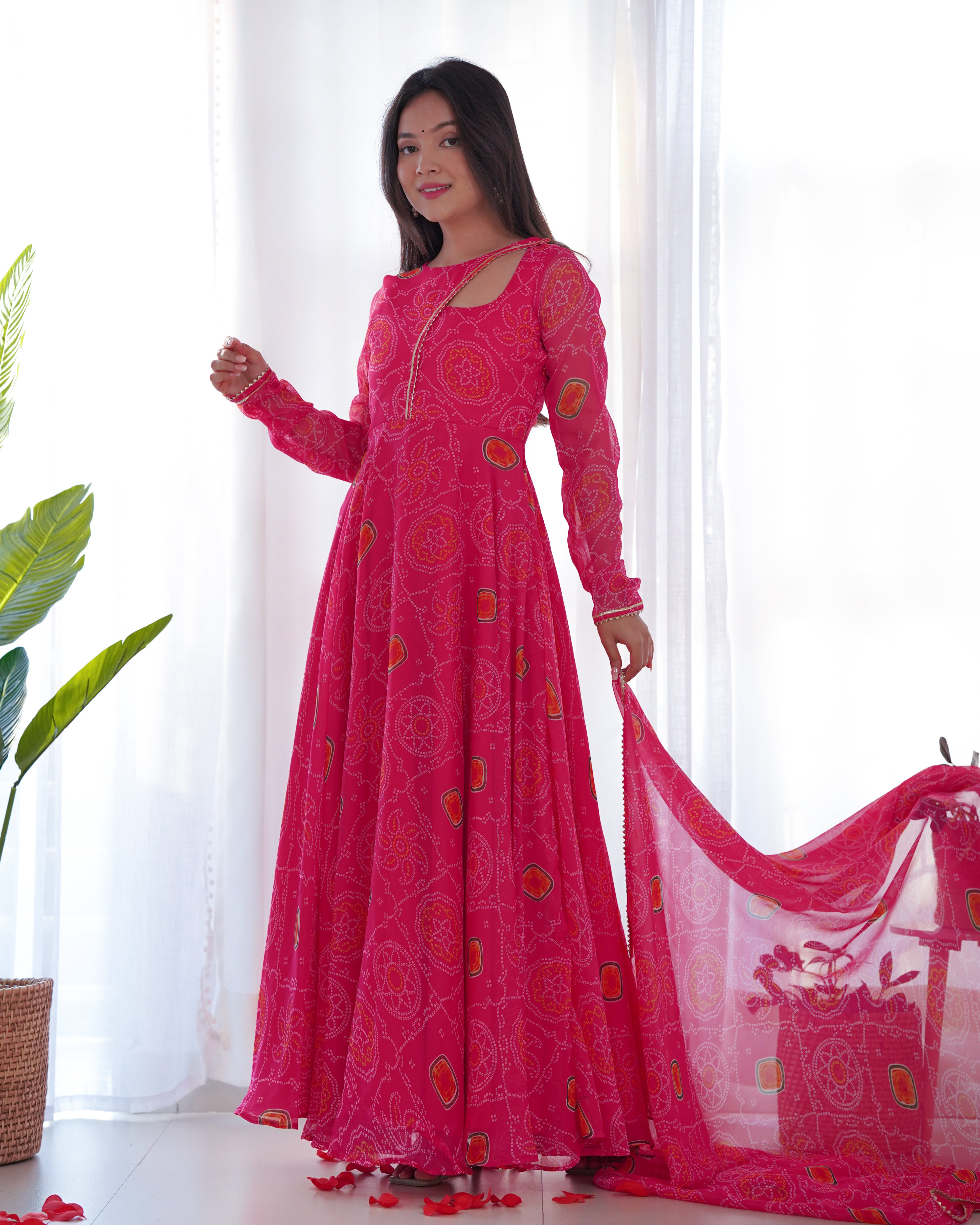 Elevate your style with this stunning and timeless Bandhej Anarkali Gown