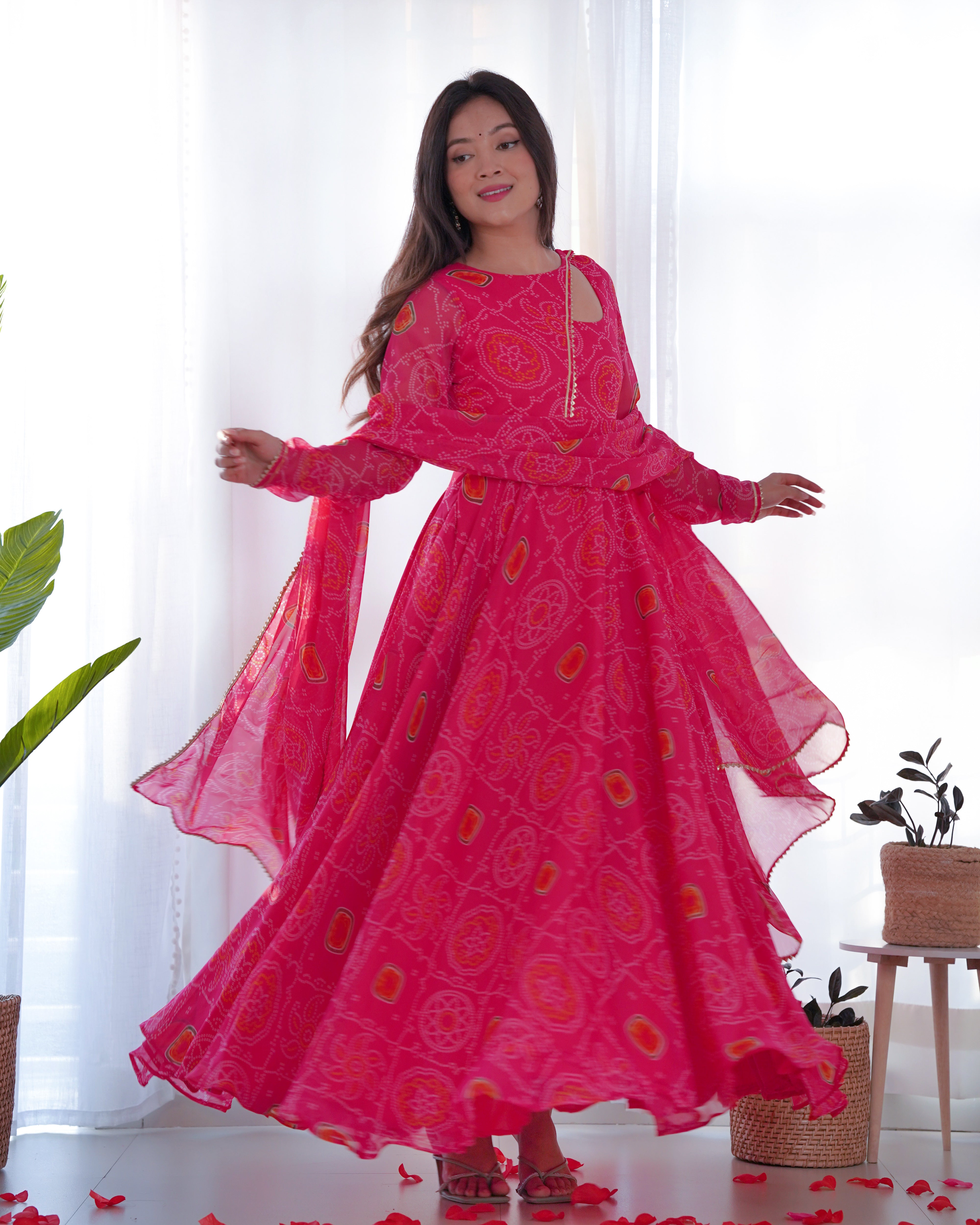 Elevate your style with this stunning and timeless Bandhej Anarkali Gown