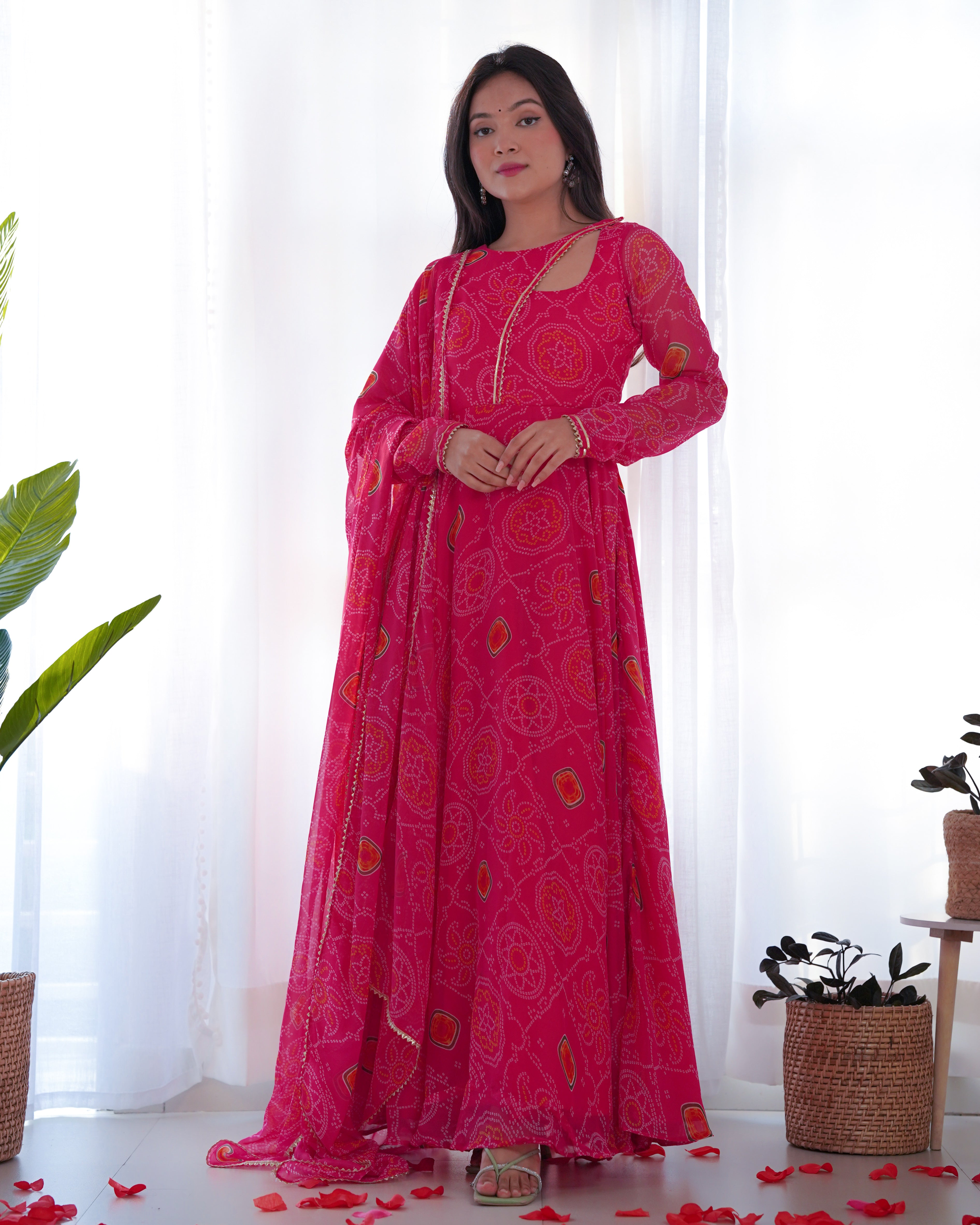 Elevate your style with this stunning and timeless Bandhej Anarkali Gown
