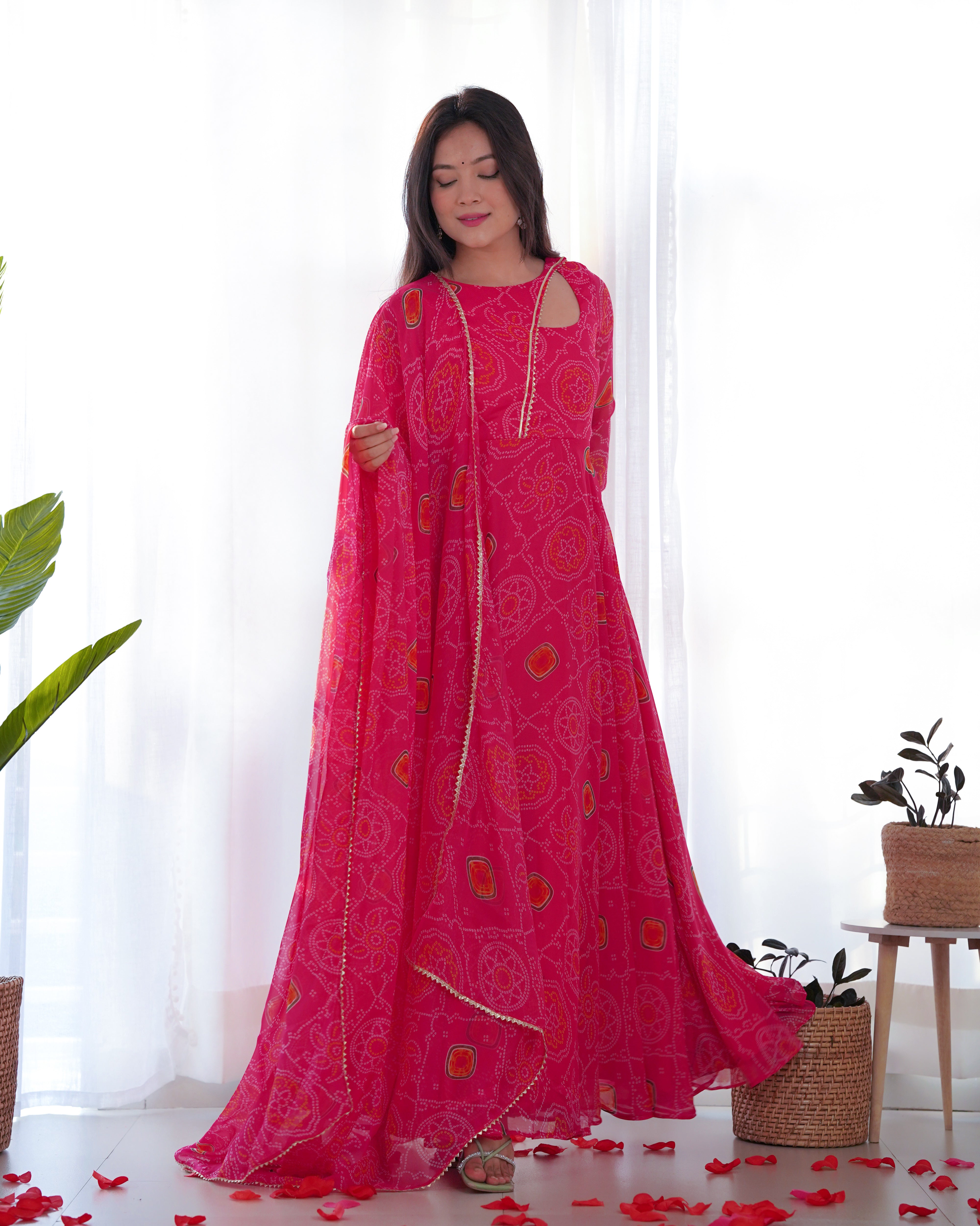 Elevate your style with this stunning and timeless Bandhej Anarkali Gown