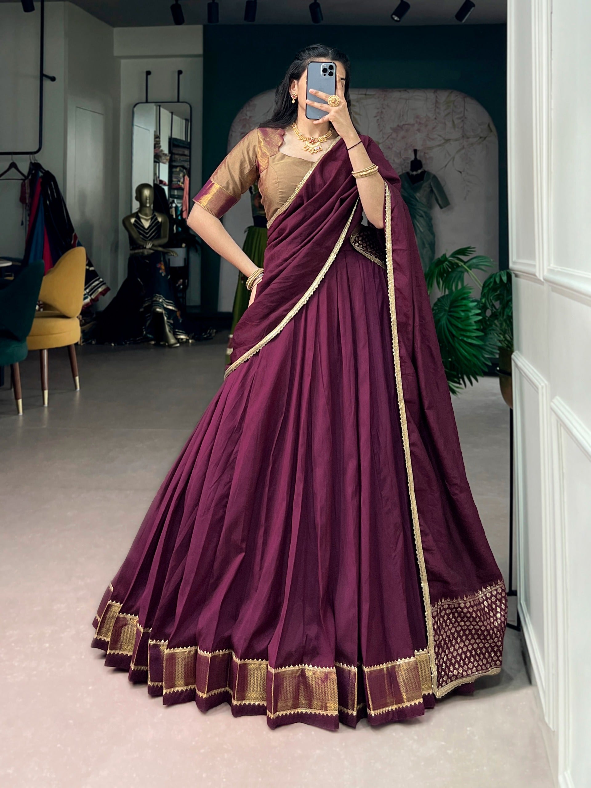 Rich wine hues and timeless golden weaves.