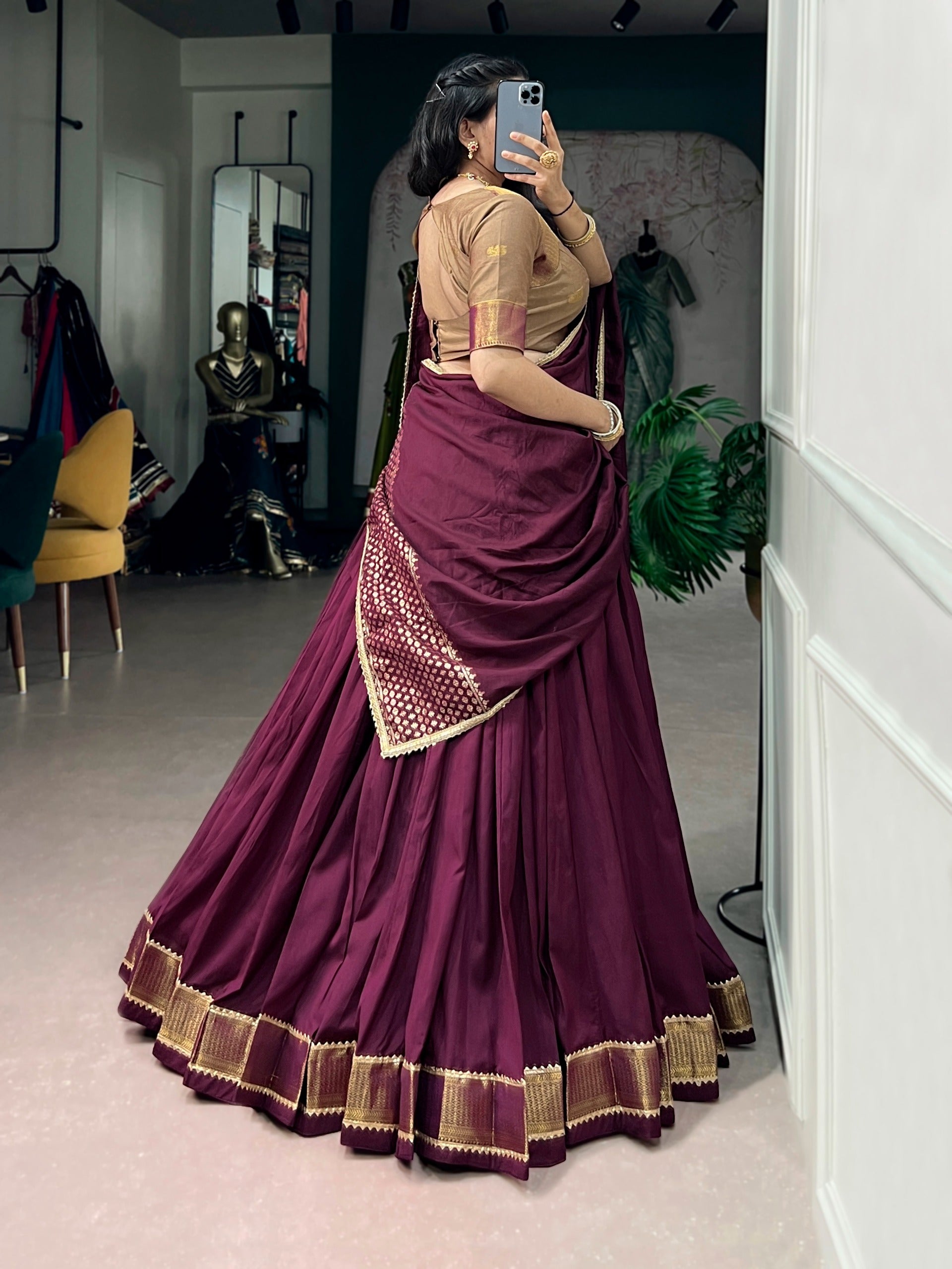 Rich wine hues and timeless golden weaves.
