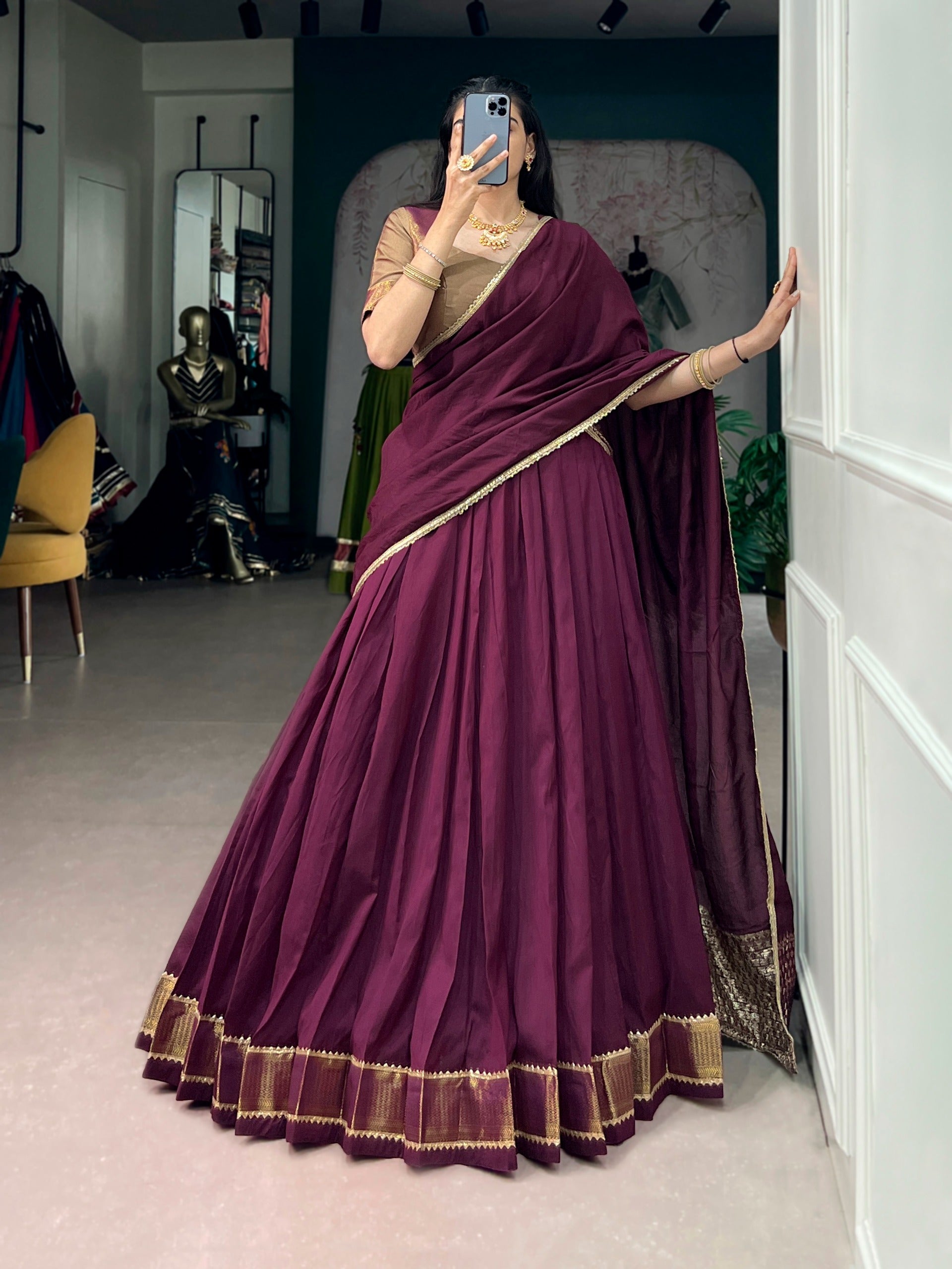 Rich wine hues and timeless golden weaves.