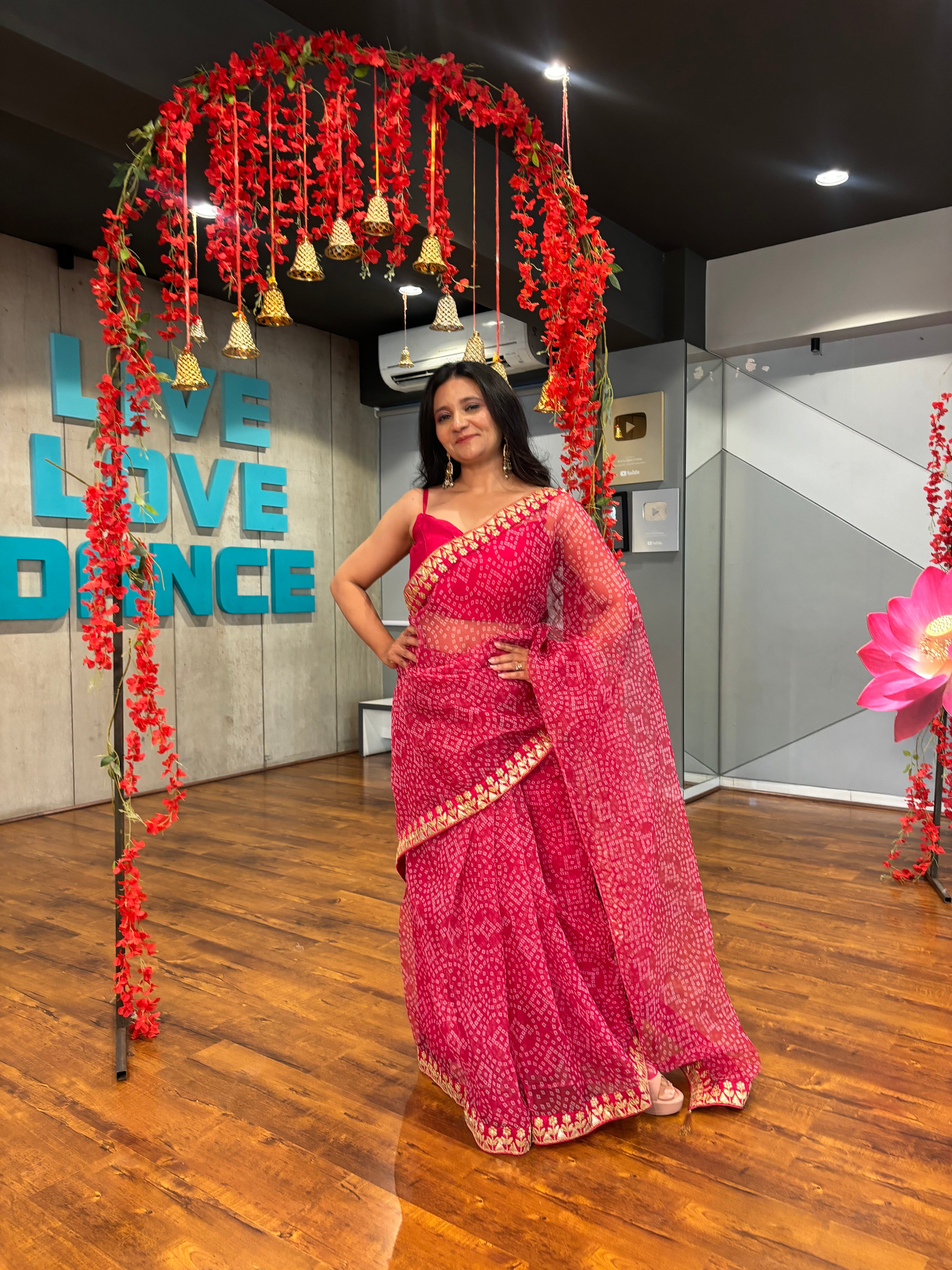 This saree is a Mood . Featuring: Bloom Bandhani Organza Saree