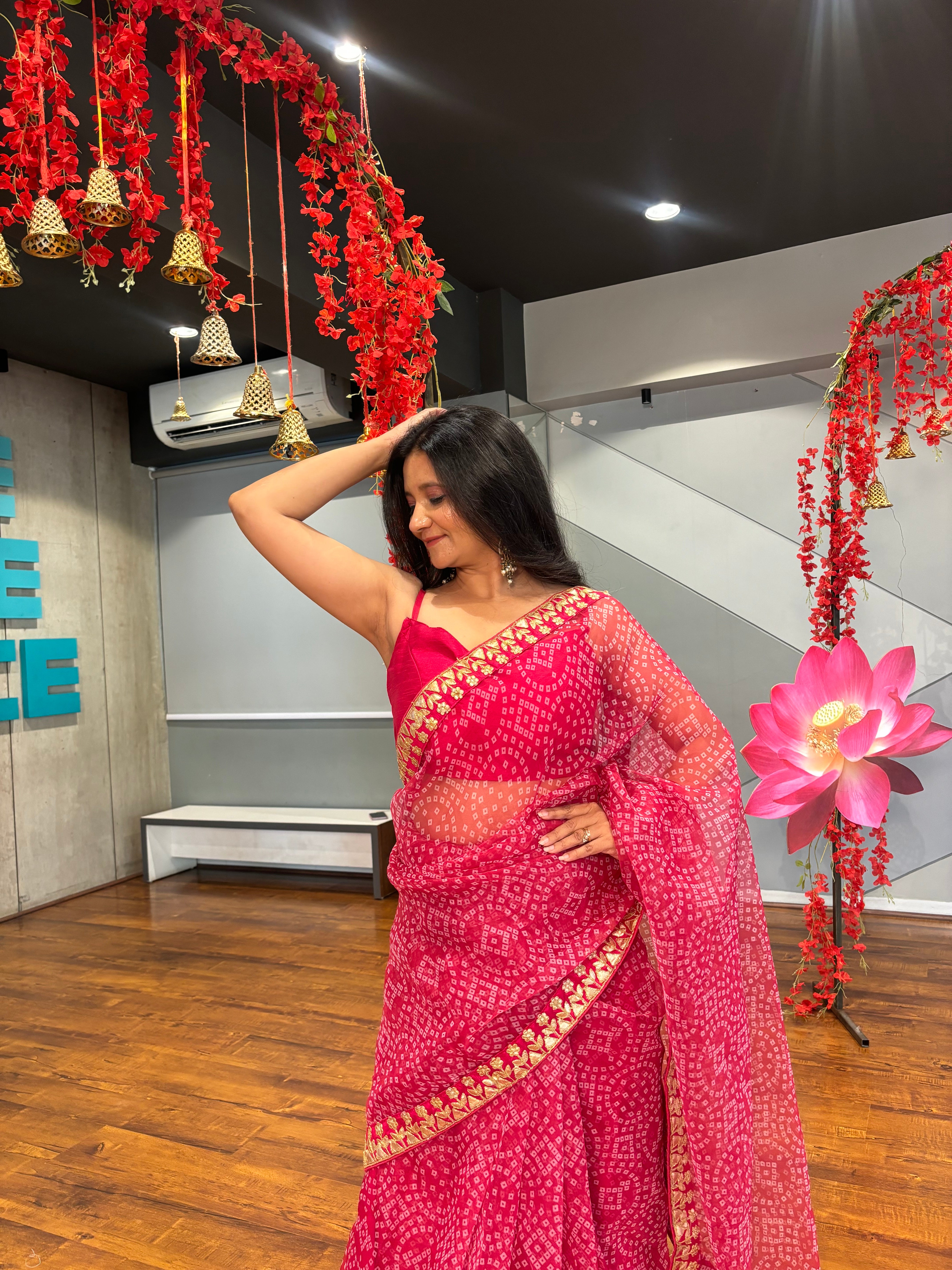 This saree is a Mood . Featuring: Bloom Bandhani Organza Saree