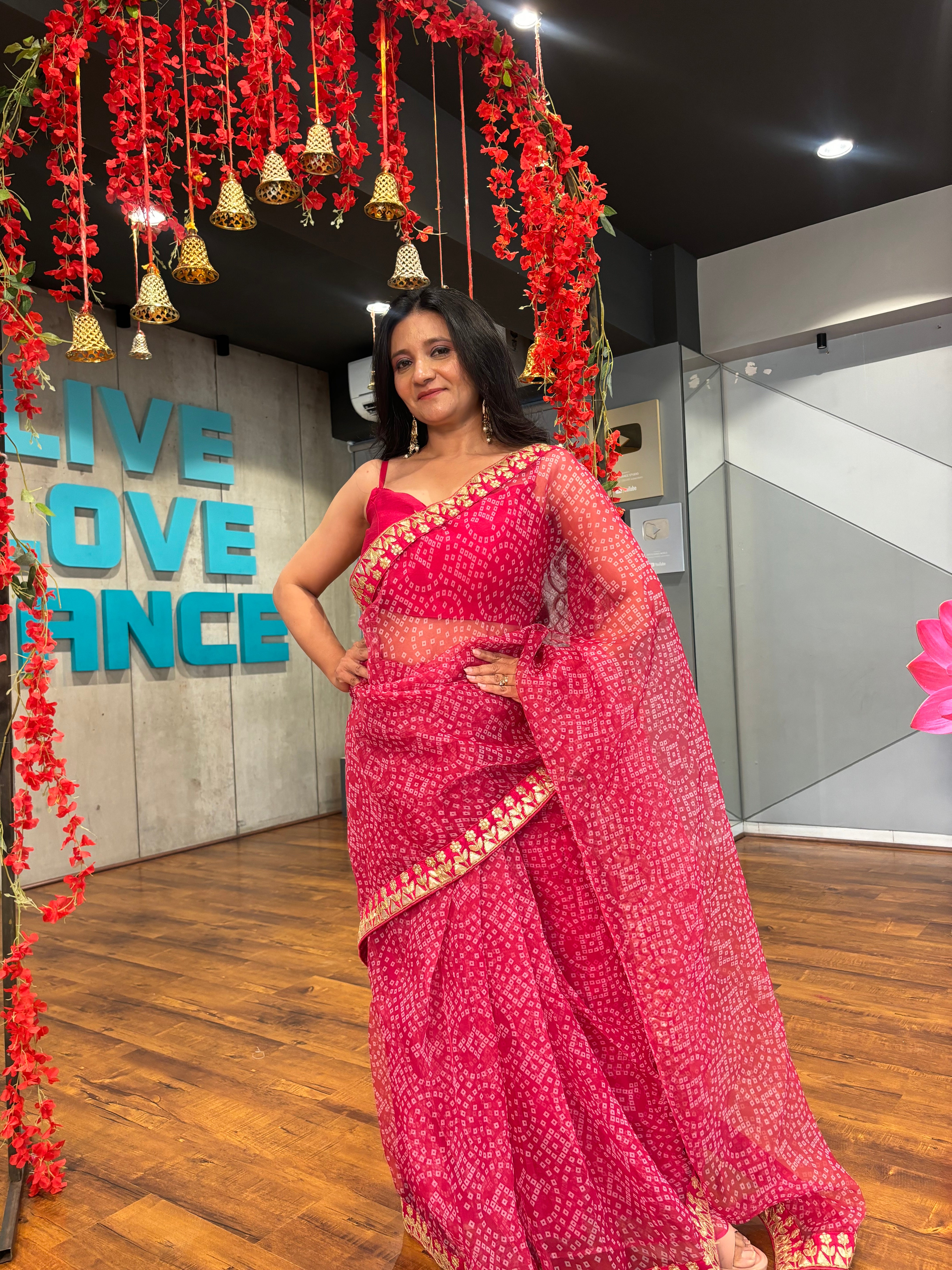 This saree is a Mood . Featuring: Bloom Bandhani Organza Saree