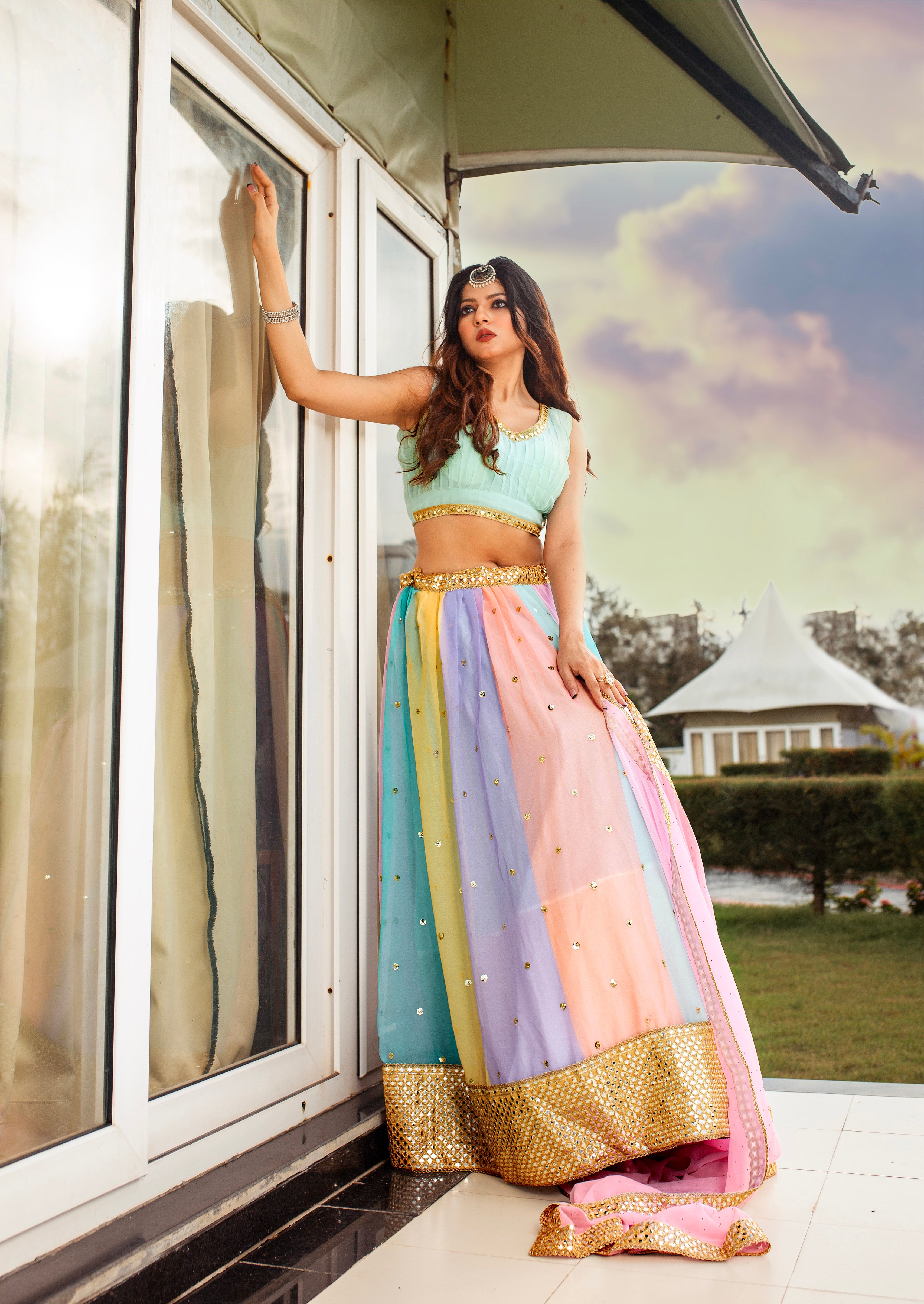 Experience the beauty of the East with our freshly arrived Multicolour lehenga set , this set is perfect for any occasion