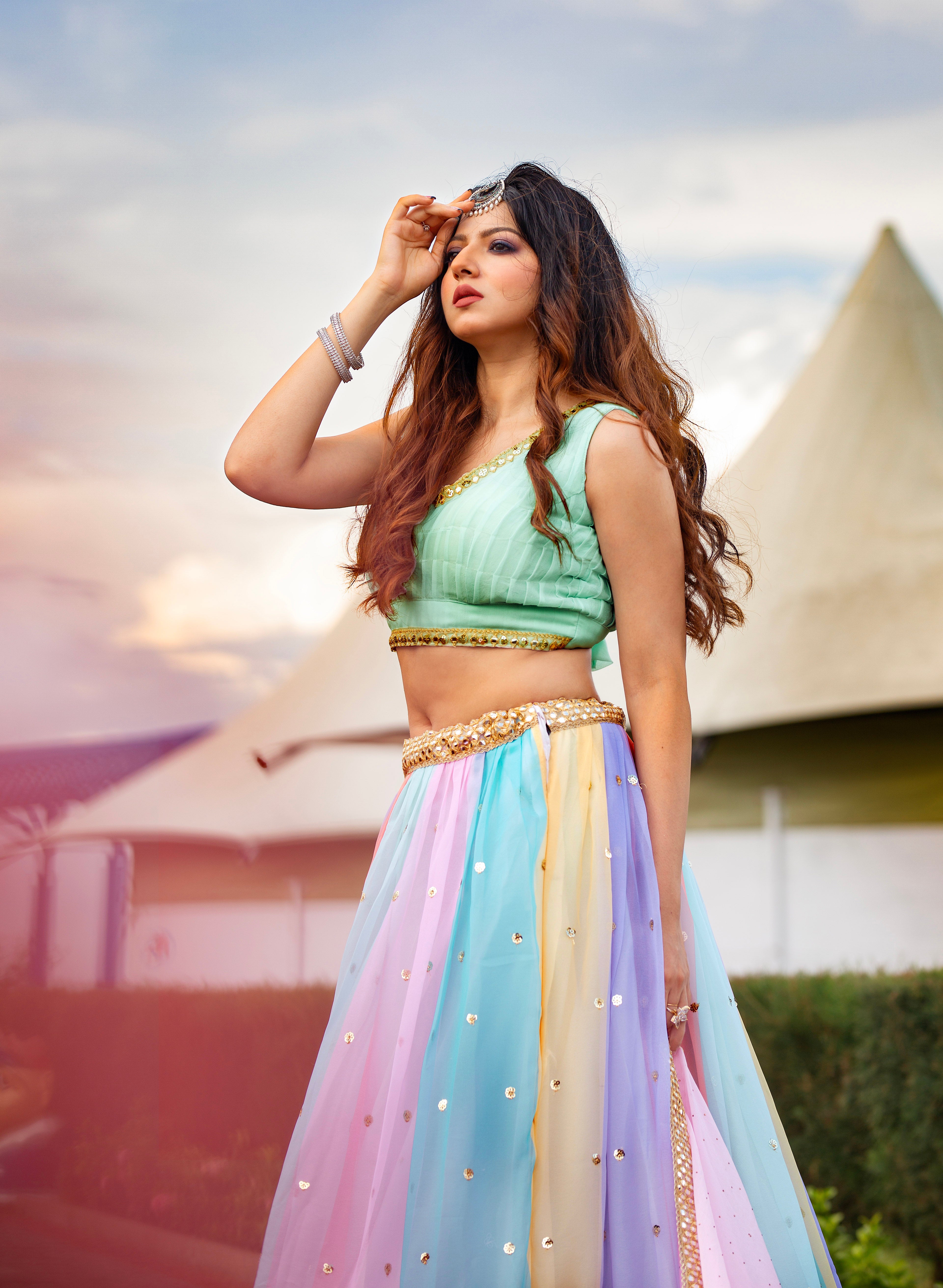 Experience the beauty of the East with our freshly arrived Multicolour lehenga set , this set is perfect for any occasion