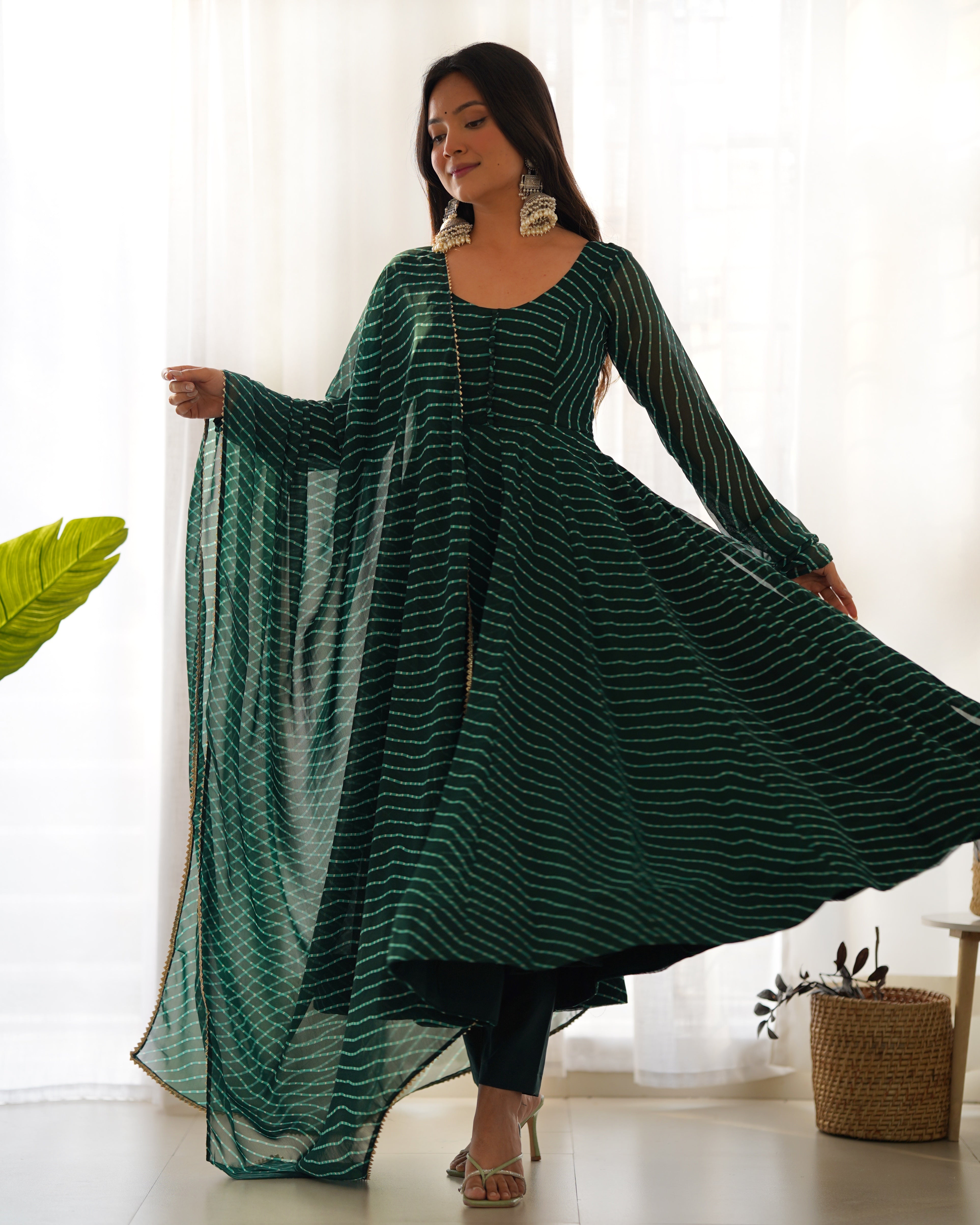 This Anarkali is perfect for any occasion. Its traditional Laheriya print is a nod to Indian culture