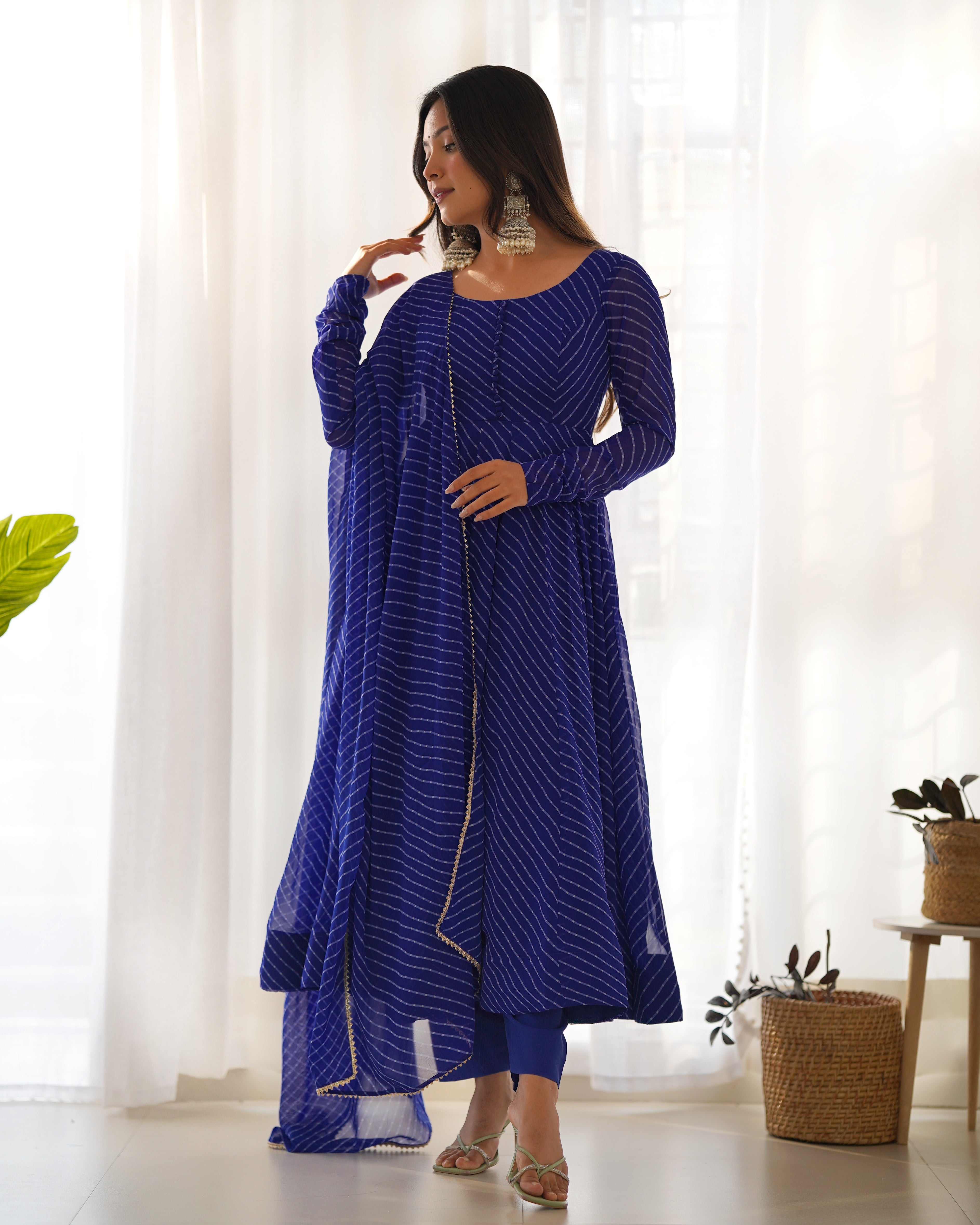 This Anarkali is perfect for any occasion. Its traditional Laheriya print is a nod to Indian culture