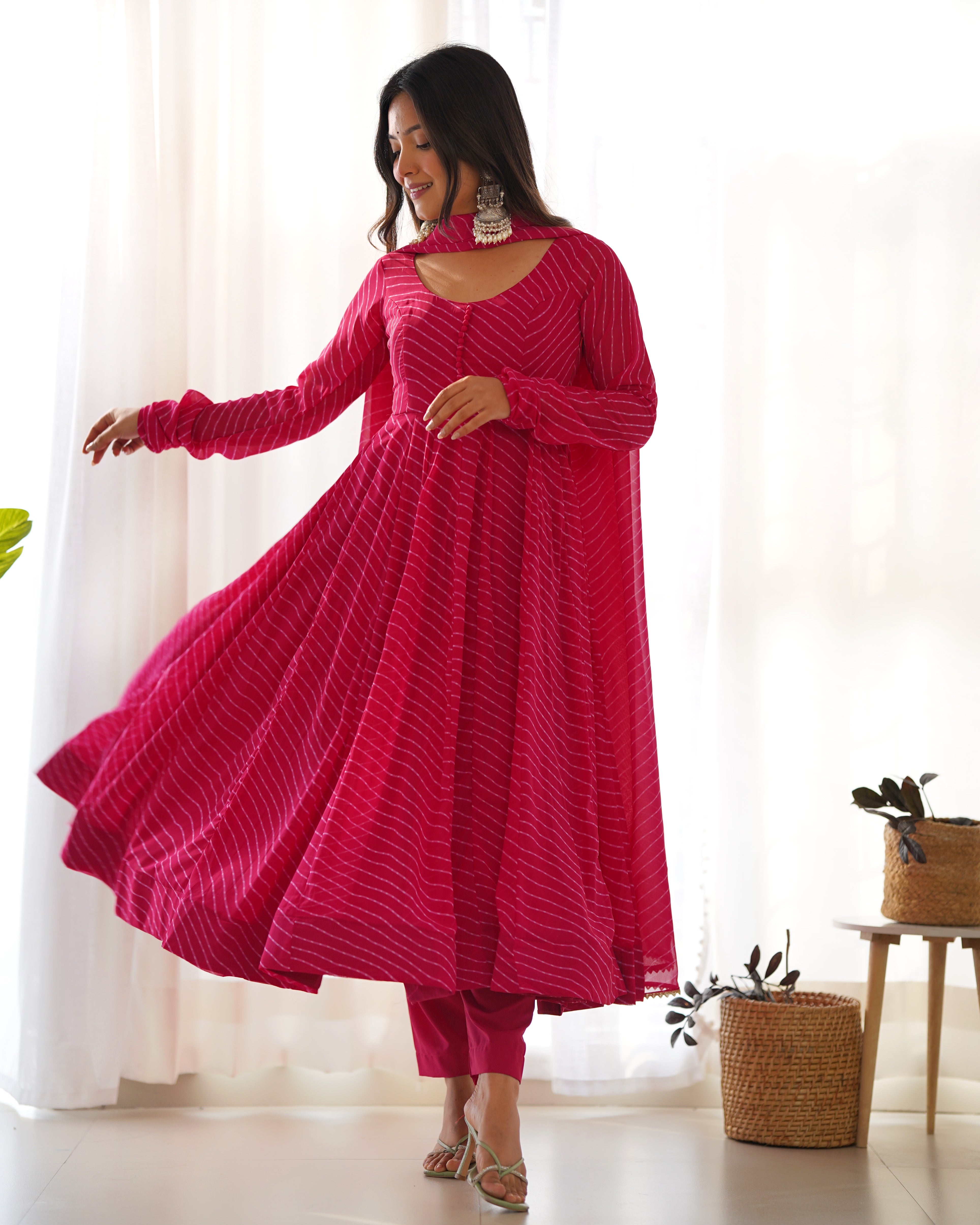 This Anarkali is perfect for any occasion. Its traditional Laheriya print is a nod to Indian culture