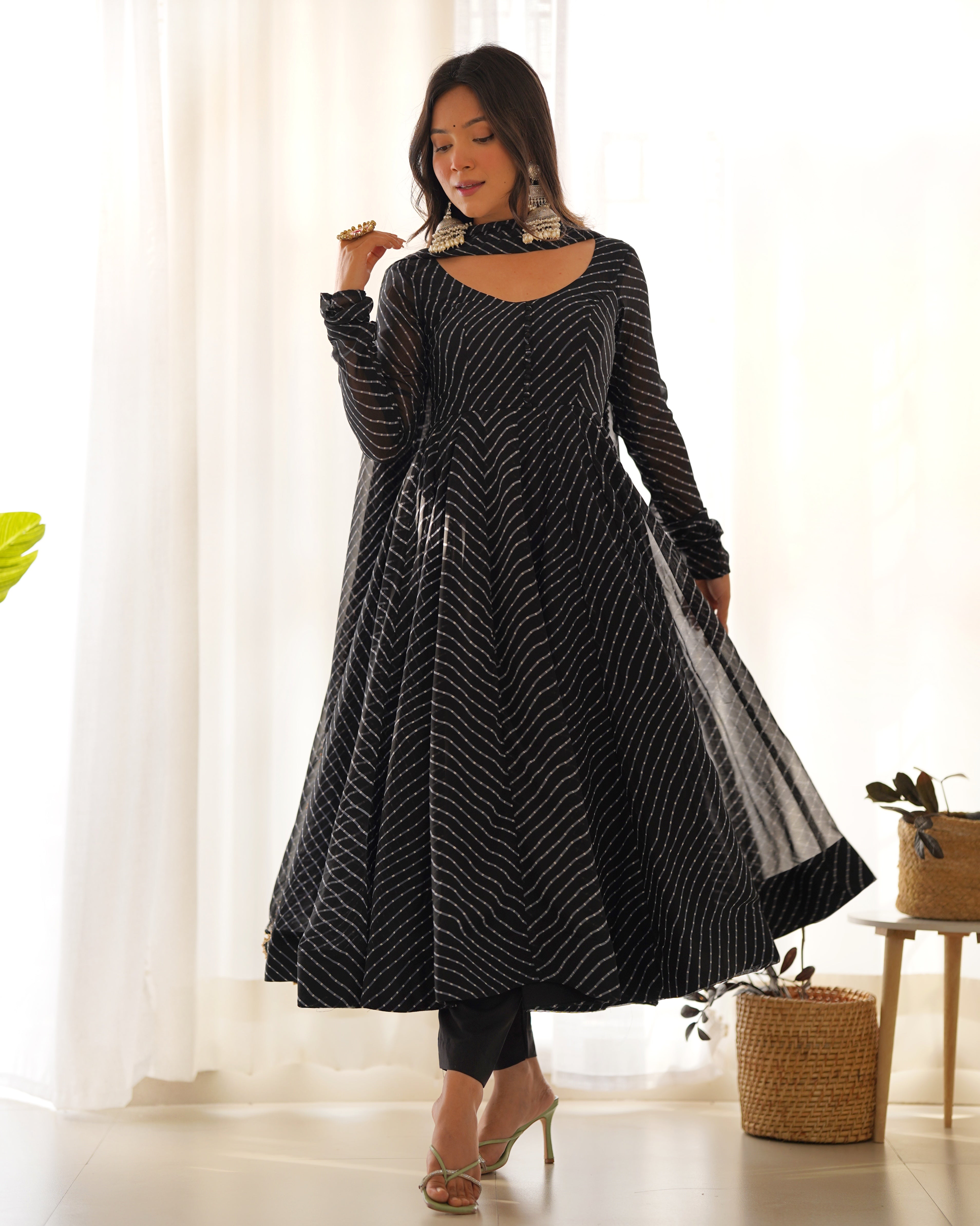 This Anarkali is perfect for any occasion. Its traditional Laheriya print is a nod to Indian culture