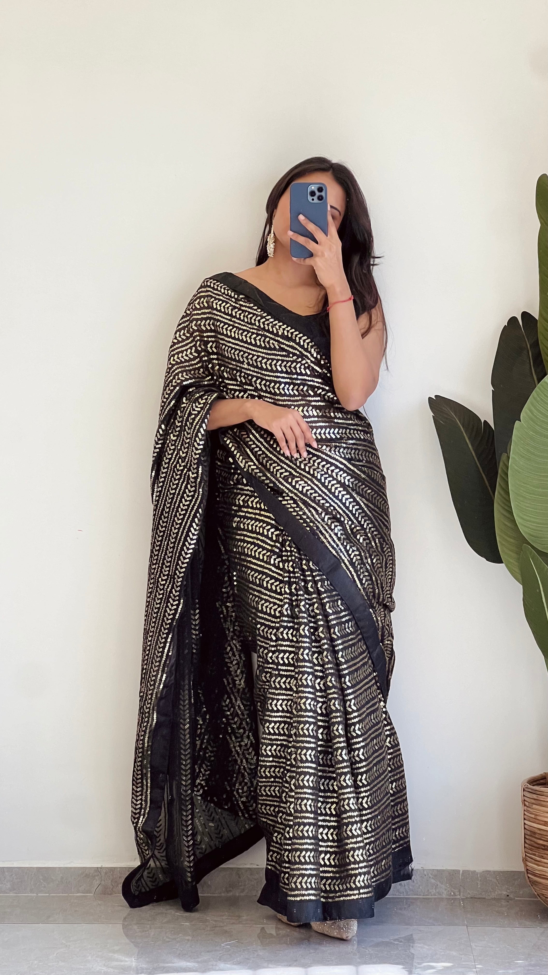 Elevate your style with this beautiful Sequins saree, perfect for any occasion.