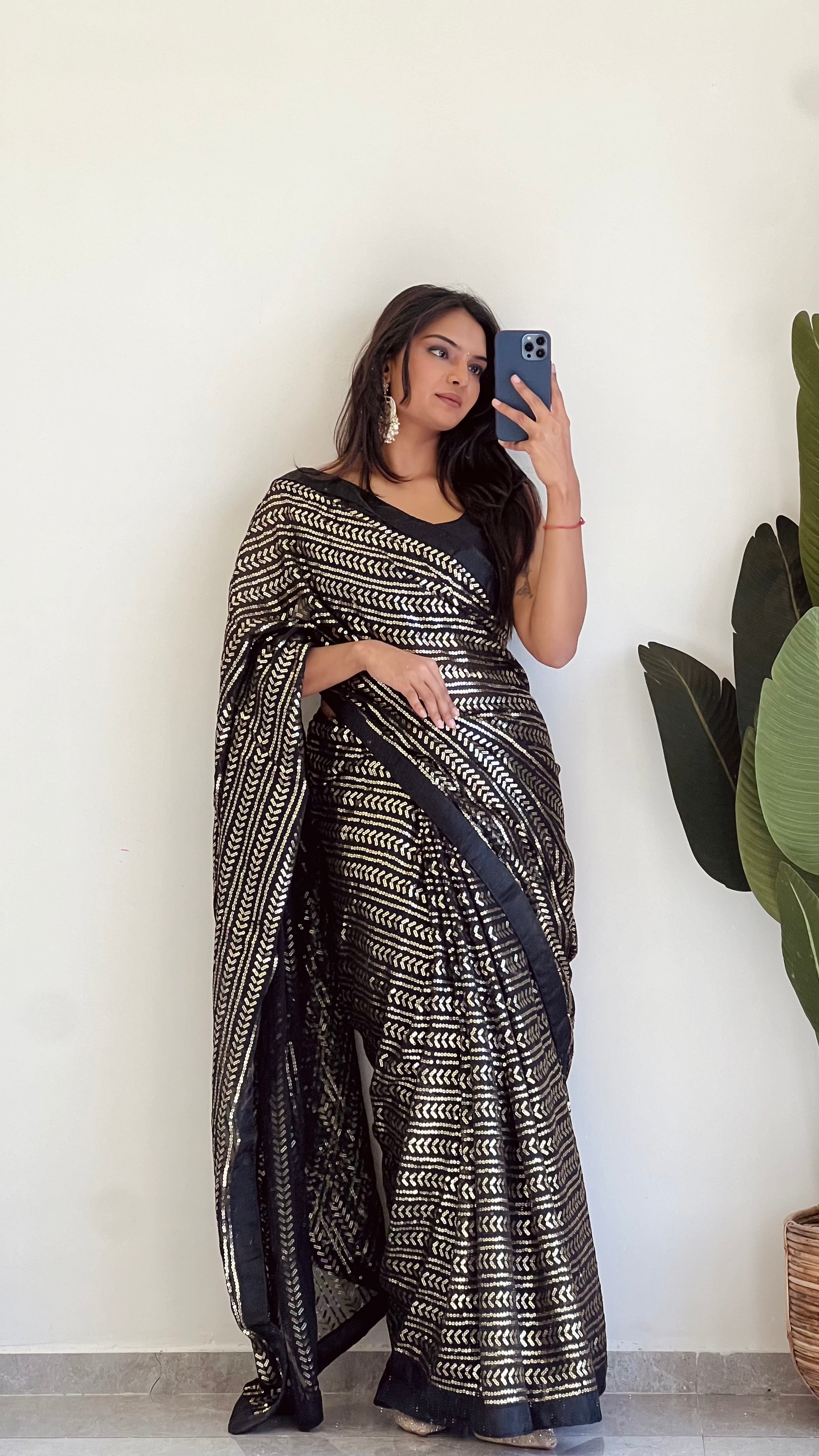 Elevate your style with this beautiful Sequins saree, perfect for any occasion.