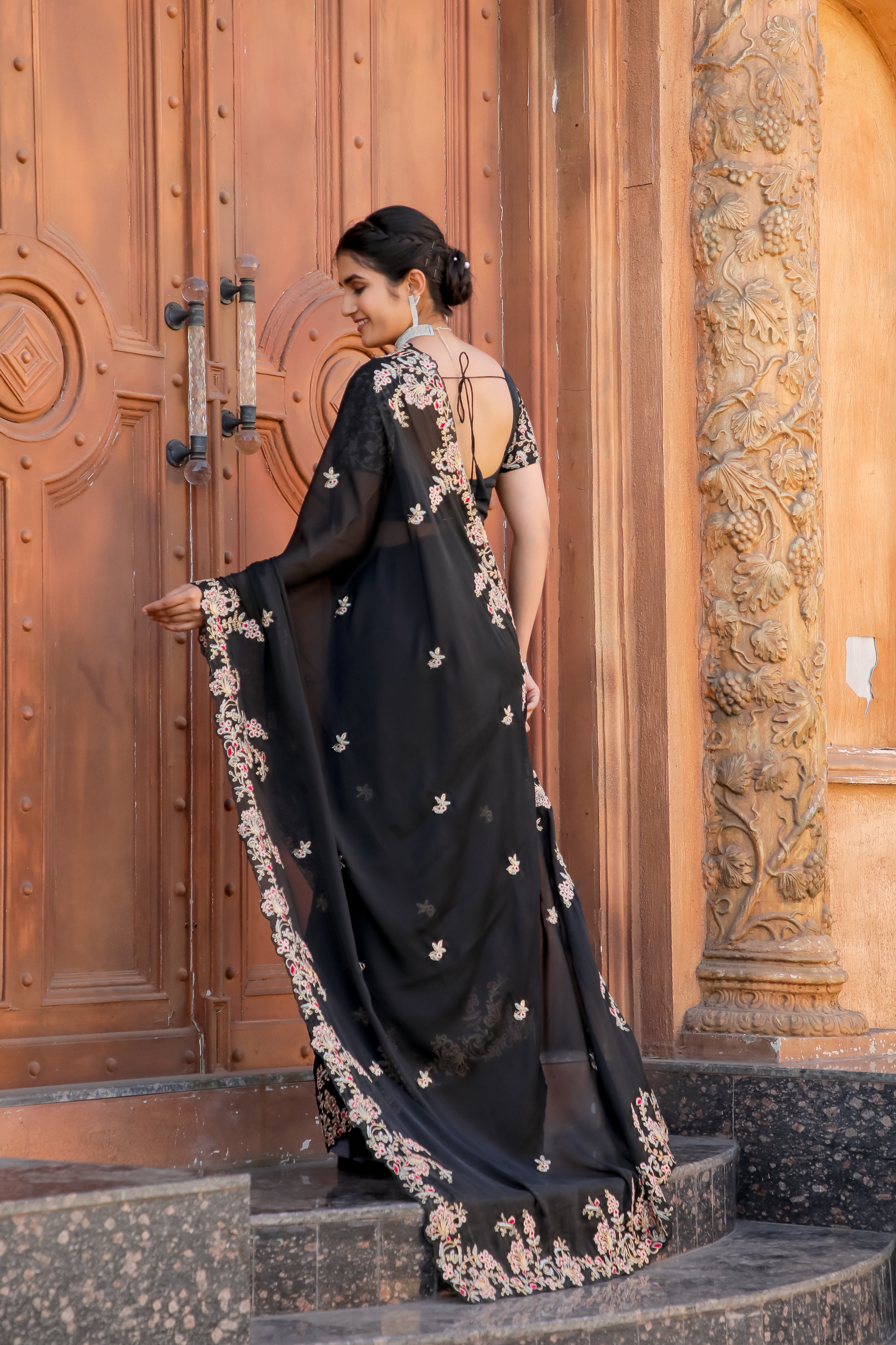 This beautiful Black Saree is just What you need for an Elegant festive Fit