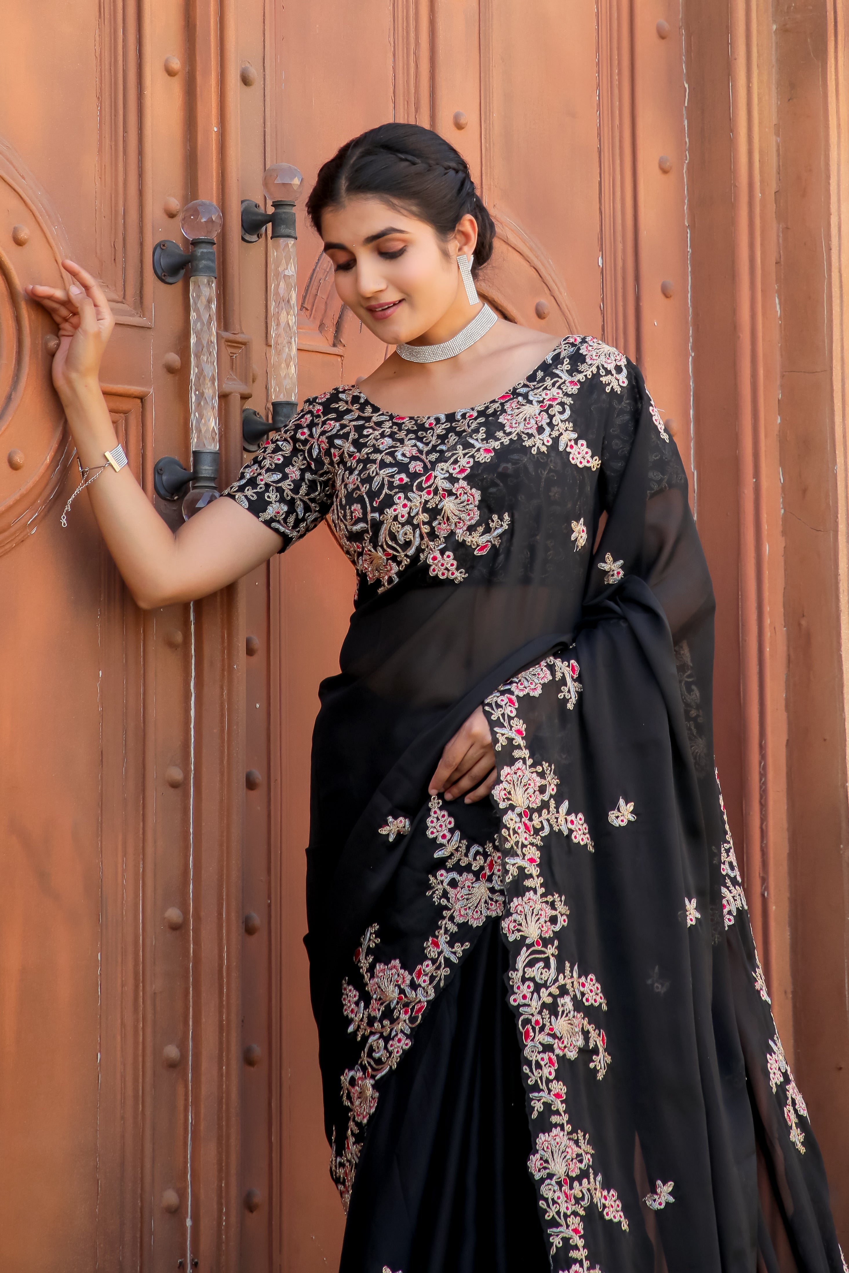 This beautiful Black Saree is just What you need for an Elegant festive Fit