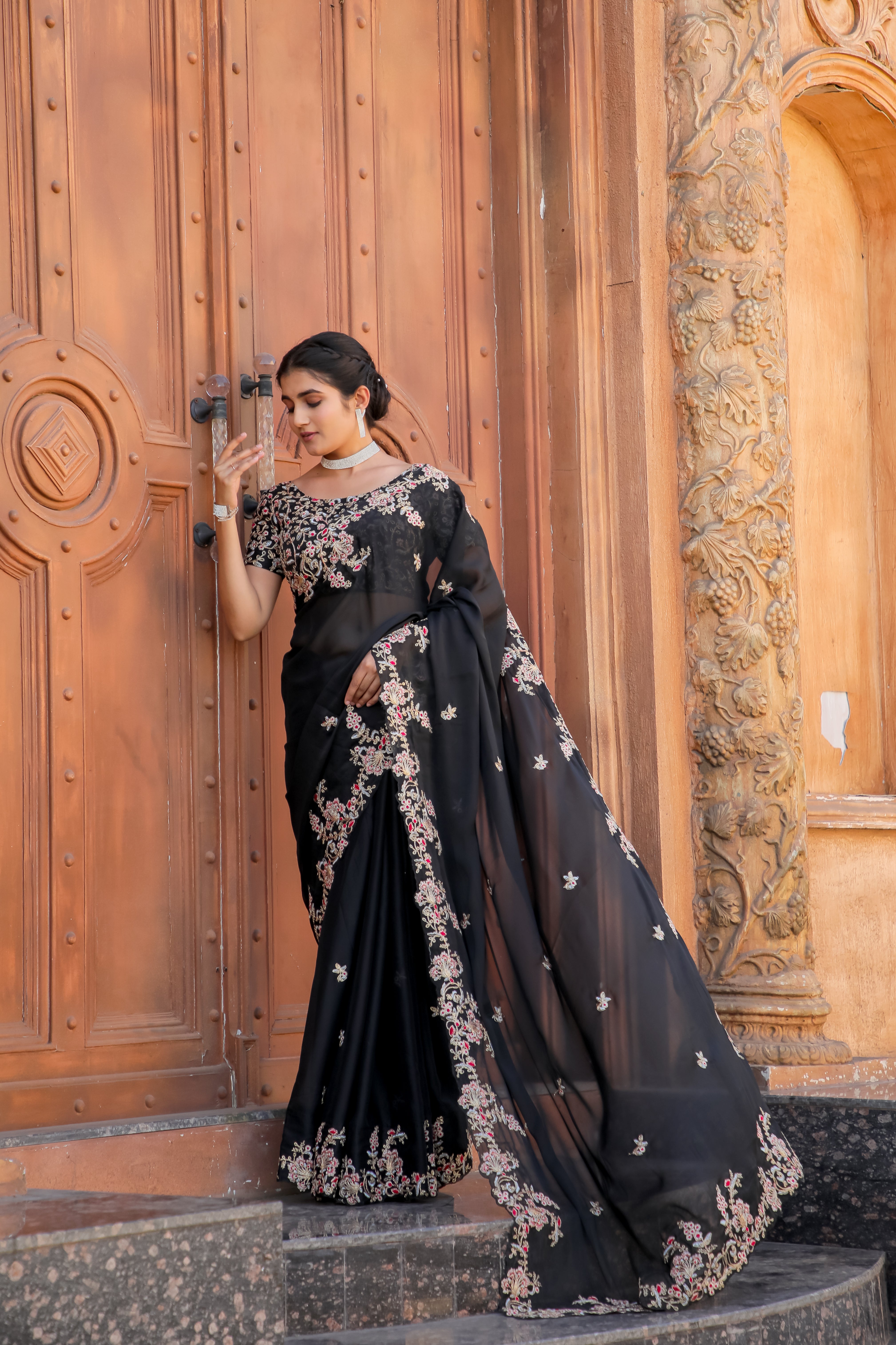 This beautiful Black Saree is just What you need for an Elegant festive Fit