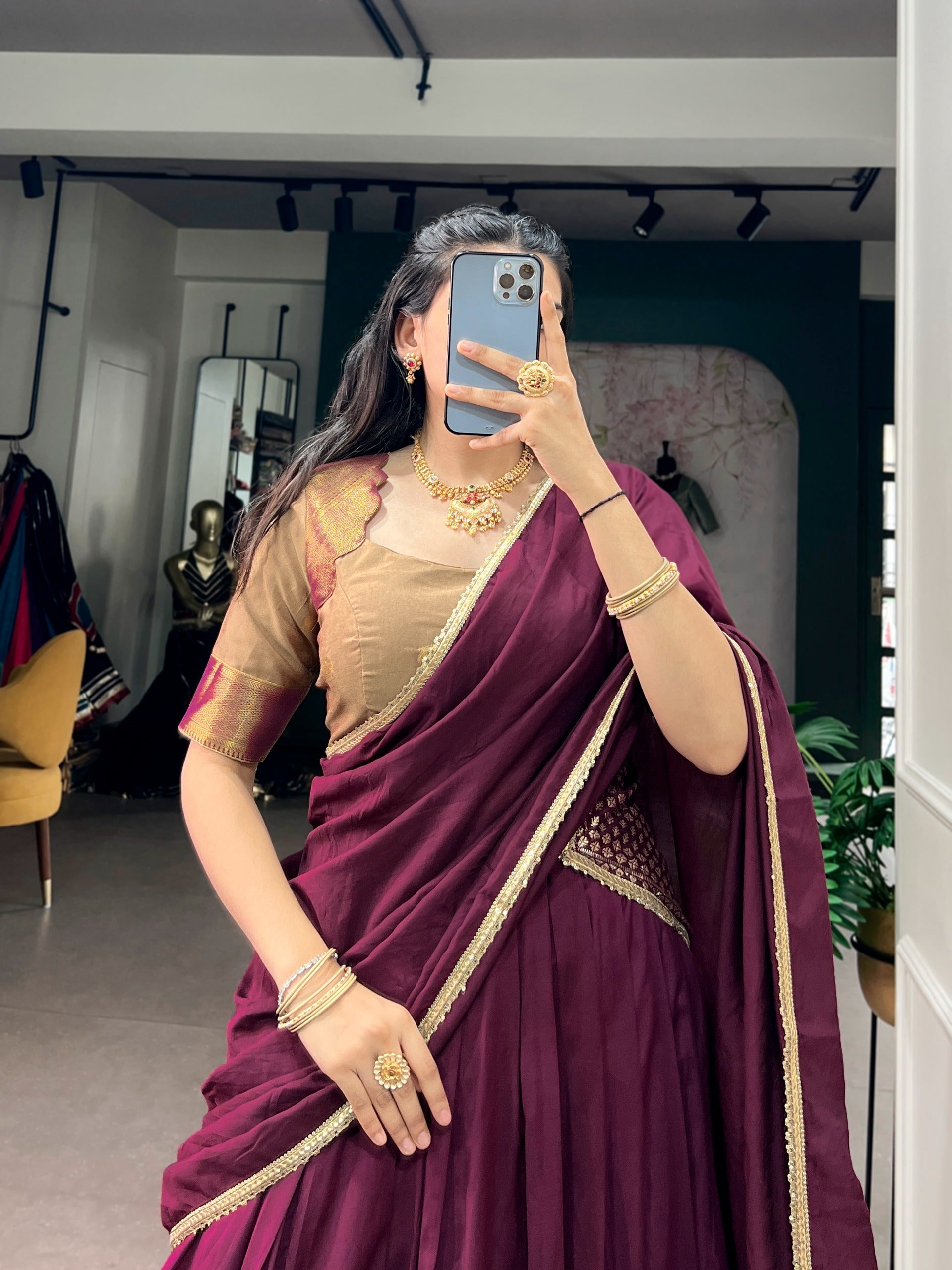 Rich wine hues and timeless golden weaves.