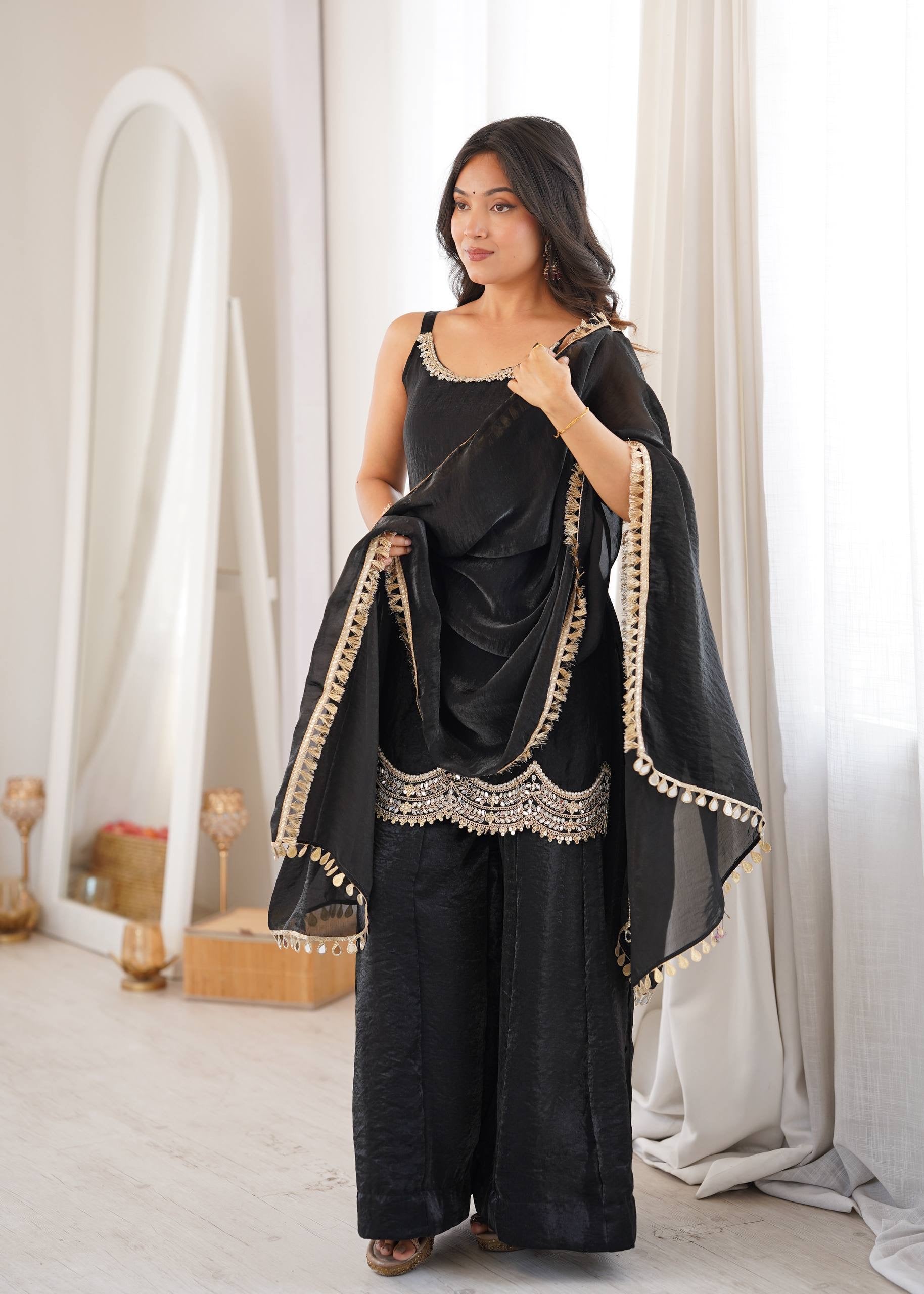 Effortless black glam with scallop-border charm.