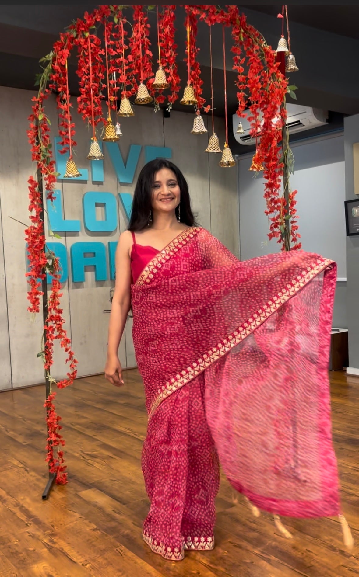 This saree is a Mood .  Featuring: Bloom Bandhani Organza Saree